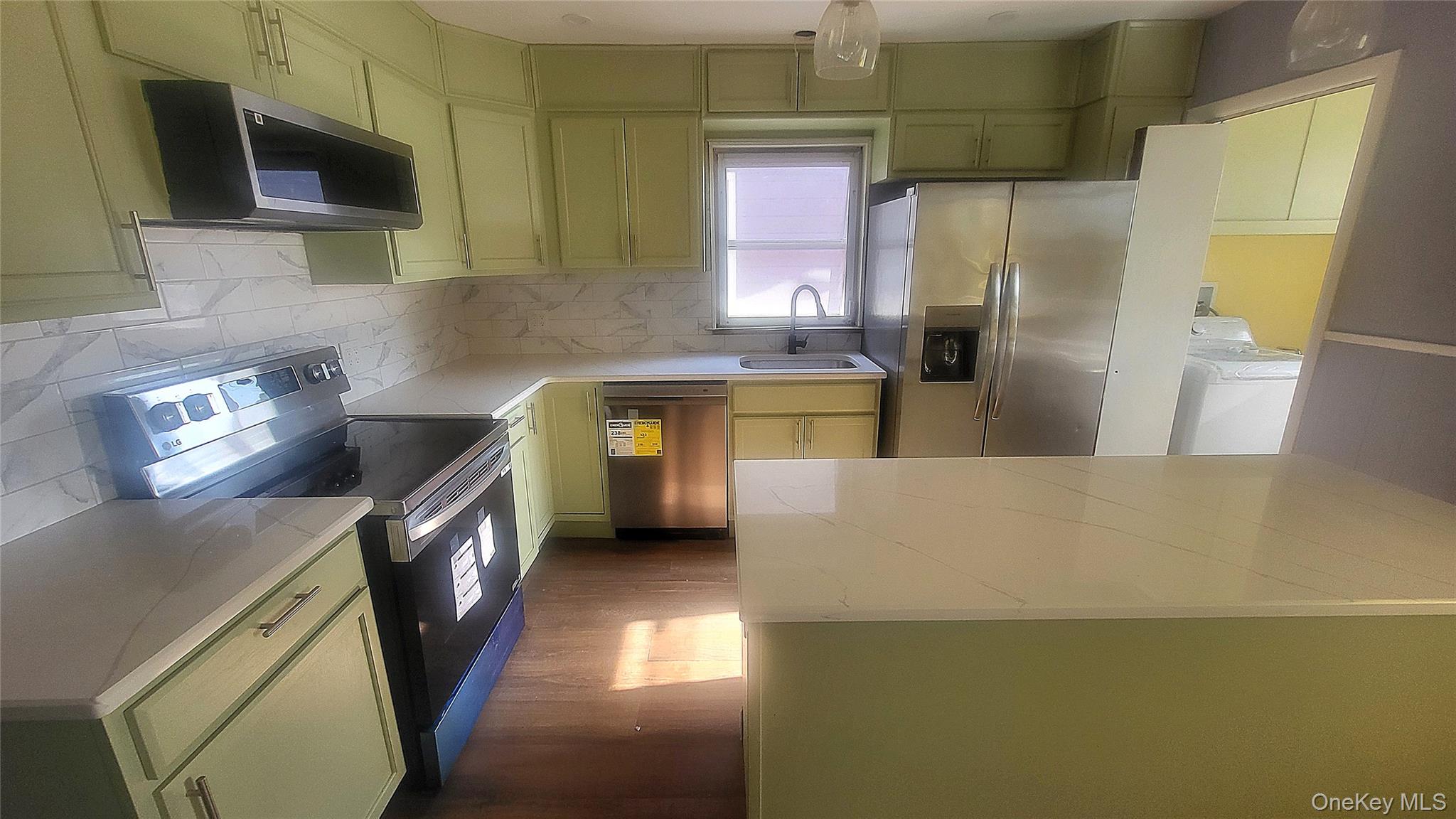 Second Floor Apartment Displays As A Two Possible Three Bedroom, One Bath With Heat And Hot Water Included. Here You Will Find An Updated Kitchen With Stainless Steel Appliances And Center Island, Laundry Room With Washer/Dryer, Hardwood Floors, Ceiling Fans, BalconyAnd More. Convenient To Amenities Most Cities Have To Offer; Schools, Major Highways, Bus Route, Shopping, Etc. A Complete Rental Application Is Necessary To Rent This Unit. No Smoking, No Pets.