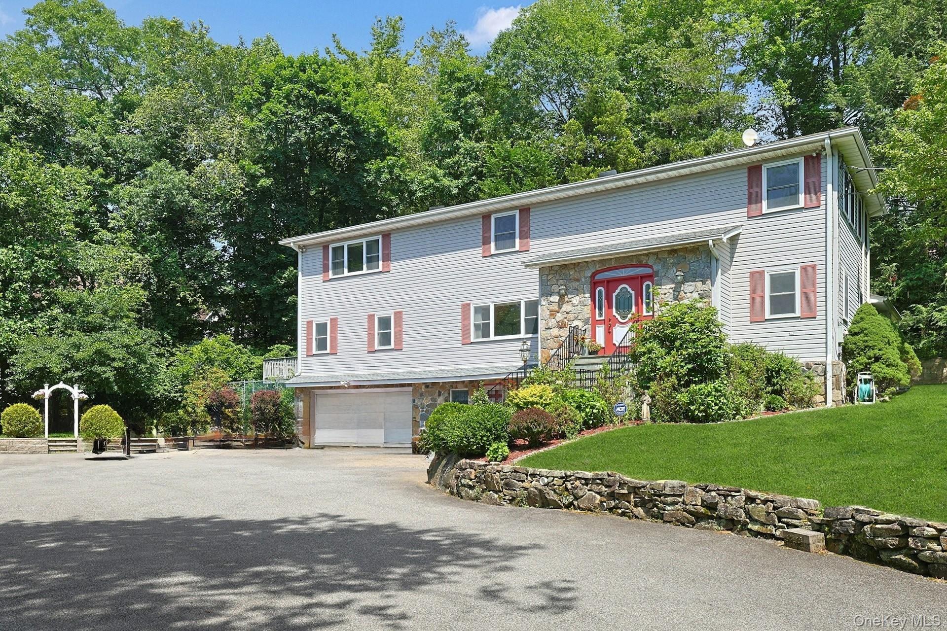 SPACIOUS, GREEN, QUIET, PRIVATE, CONVENIENT, COMFORTABLE 5 bedroom 3.5 bath colonial in Central Westchester is calling you! If coming home to a pretty property surrounded by flowering bushes & trees sounds good, you&rsquo;ll love it even more knowing it&rsquo;s set back from road with parking for 5+ cars in its 2-car garage and driveway. Let&rsquo;s enter the gracious tiled foyer, guest powder room, living and dining rooms, 1st floor bedroom (shown as office) and full bath, and kitchen. Then, step into the greatest of great rooms, a tiled atrium style custom built addition perfect for entertaining, games, lounging and living your best life. This opens to the large back patio and above ground pool with sundeck surround, and yard meant for playing & gardening. Go upstairs to check out a huge primary bedroom & bathroom, and 3 more bedrooms and a hall bath. This sounds like plenty of space, right? But wait, there&rsquo;s the basement! Large flexible recreation room, laundry, storage, and separate entrance. Just around the bend from the Rose Hill Shopping Center, near schools and transportation. PRICED TO SELL!