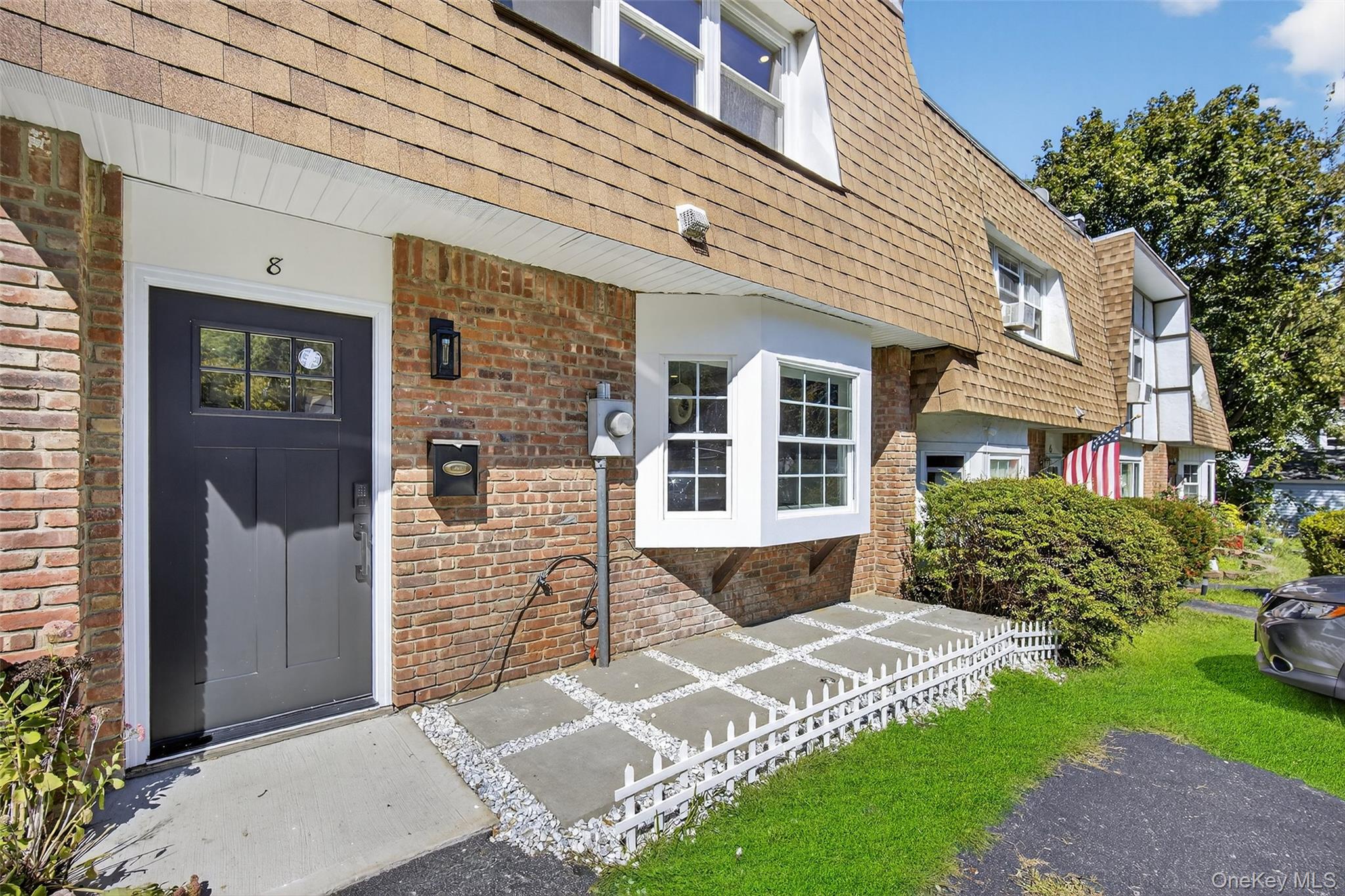 Welcome to 8 Roundtree, a modern, fully custom townhouse in the heart of Beaconâ€”perfectly designed for the discerning renter seeking refined style and comfort. Completely gutted and rebuilt with high-end finishes, this home welcomes you with sleek black kitchen cabinetry, new countertops, top-of-the-line appliances, designer pendants, and recessed lighting. A sunlit bay-window nook offers the ideal spot for morning coffee, while elegant chevron-patterned flooring flows seamlessly throughout the kitchen, living room, and hallways, creating a rich, cohesive feel underfoot.Adjacent to the living space, a repurposed boiler room now provides functional charm with its crisp tile flooring and fresh wallsâ€”an ideal storage area or flexible utility zone. The living room itself features new flooring, a sliding glass door, and a picture-perfect window that beautifully bridges indoor warmth with direct access to the outdoors. On the first floor, the new powder room captivates with bold black tile flooring and a floating vanityâ€”a striking blend of contemporary form and everyday function.Upstairs, unwind in luxuriously refurbished spacesâ€”a spa-like bathroom with marble-stone flooring, rain-shower/tub combo, matte-black fixtures, custom vanity, and well-placed lighting. Bedrooms are renewed with updated flooring, doors, and two newly installed windows. Thoughtful architectural touchesâ€”including staircase tile accents and hallway moldingâ€”add upscale comfort throughout.Step outside to enjoy a fresh front patio and a fully fenced backyard with new walkways and a storage shedâ€”perfect for privacy, gardening, or peaceful evenings outdoors. Rents in Beacon are competitive, with a median around $2, 900â€”making this impeccable condo a standout opportunity in a strong rental market. Beacon itself is sought after for its vibrant arts scene, historic Main Street, and convenient train access to NYC. For renters craving design-forward living, 8 Roundtree isnâ€™t just a place to stayâ€”itâ€™s a thoughtfully curated retreat.