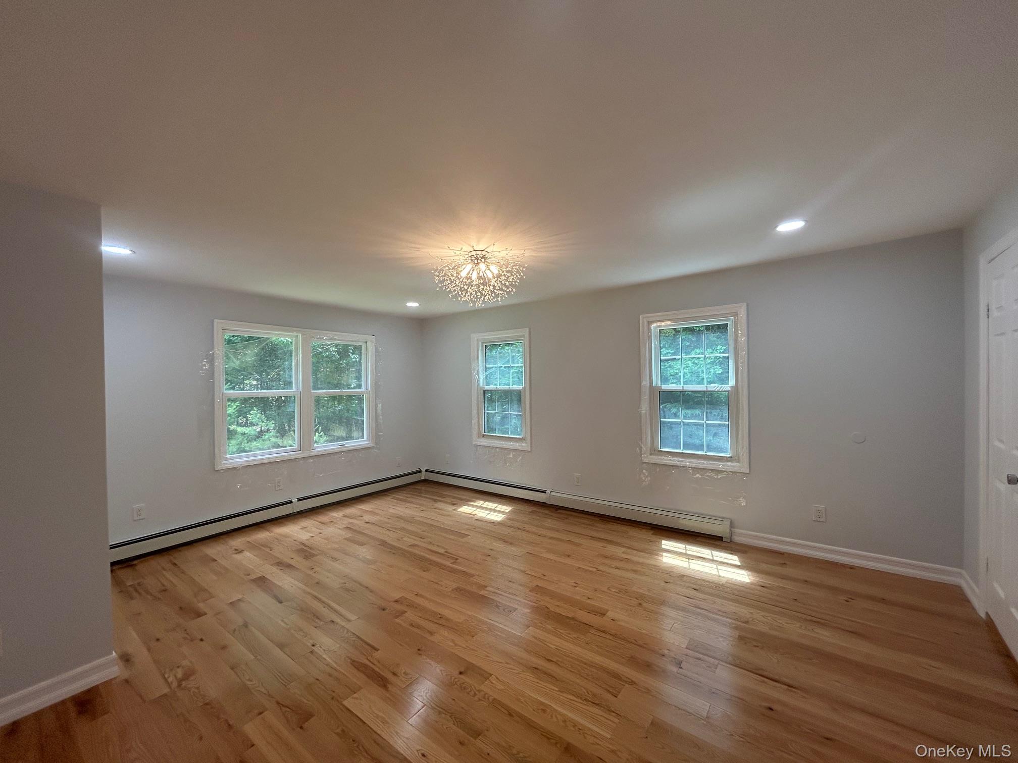 Welcome to this fully renovated interior with high-end upgrades throughout. The first floor offers two generously sized living roomsâ€”one with wood-burning fireplace, and the other with a full bathroom, ideal for hosting guests. The kitchen and dining area are finished with tile flooring. The kitchen is outfitted with brand-new stainless steel appliances. four bedrooms and two bathroom on the 2nd floor. Triple pane tilt windows. Great Commuter Location, less than 10 minutes to the Otisville Train Station.