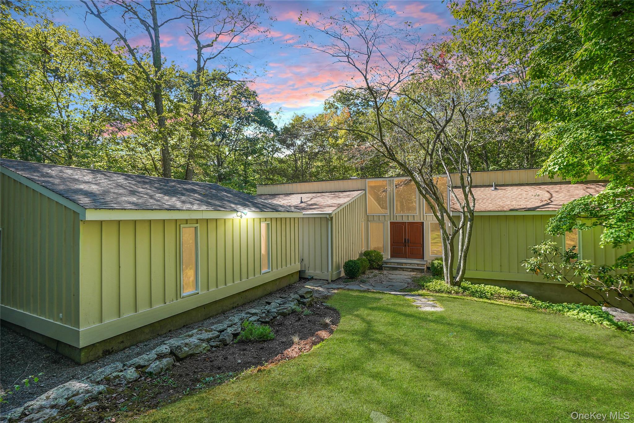 Nestled in sought-after Pound Ridge, this exceptional 5BR/3.5BTH residence offers an extraordinary blend of sophisticated living and natural tranquility. Spanning over 3, 600 sq ft, this home presents an ideal sanctuary for discerning buyers seeking both luxury and comfort in one of Westchester&rsquo;s most coveted locations. Upon entering, you are immediately struck by the dramatic architectural elements that define the home&rsquo;s character. Soaring sky-high ceilings create a sense of space and grandeur, while exposed wood beams add warmth and rustic elegance throughout the interior. The thoughtfully designed floor plan maximizes both functionality and flow, accommodating the needs of modern life while maintaining distinct spaces for relaxation and entertainment. Five generously sized bedrooms provide ample accommodation offering comfortable sleeping quarters and tons of natural light. The primary bedroom serves as a true retreat, featuring the tastefully renovated ensuite bathroom (2025) that showcases high-end materials and modern amenities. Three and a half bathrooms throughout the home ensure convenience and privacy for all occupants, with each space thoughtfully appointed. The additional half bathroom provides practical functionality for entertaining and daily use, conveniently located off of the mudroom. The heart of the home encompasses inviting living spaces that seamlessly blend comfort with style. Whether hosting intimate gatherings or large celebrations, the open and airy layout accommodates various entertainment needs while maintaining a sense of warmth and intimacy. The exposed beam details and soaring ceilings create architectural character that distinguishes this property from typical suburban offerings. Boasting nearly 2.25 acres, the outdoor space extends the home&rsquo;s living area seamlessly into the natural environment which provide the canvas for year-round outdoor living experiences. While tucked away on a quite cul-de-sac, the location still offers an enviable combination of small-town charm and NYC accessibility. Just one mile from the charming Pound Ridge Village, residents can explore local shops, restaurants, and tons of community events. Nature enthusiasts will appreciate the proximity to De La Torre Preserve, offering hiking trails, wildlife observation and peaceful spaces for outdoor recreation. New Canaan Metro North located just a short 12 minute drive makes your NYC commute easy, with just a 68 minute express train to Grand Central Station. First time on the market in over 25 years, this truly stunning home is just waiting for its new owners!