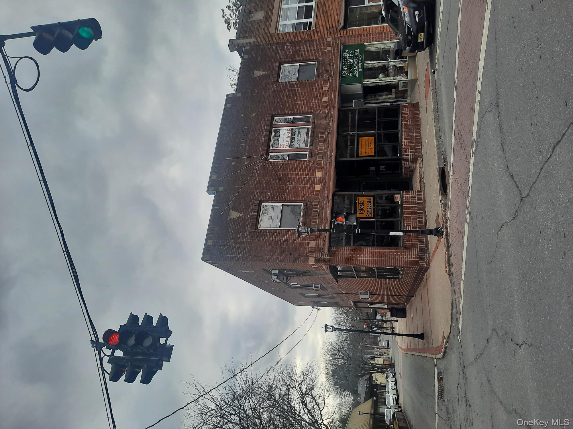 Prime retail and office space with historic charm in the heart of Ellenville. This 4, 200 sq ft brick building is a unique opportunity for entrepreneurs, artists, and service providers. It features stunning, ornate tin ceilings and enjoys high visibility with a prominent corner location at Canal Street and Market Street.The ground floor retail area is perfect for a creative storefront, capitalizing on the vibrant downtown energy. It is situated directly across from the Chamber of Commerce, municipal parking, and the renowned Shadowland Theatre. The top floor is currently zoned for office space, with three vacant suites offering immediate occupancy. For a long-term vision, the upper level could potentially be converted to residential apartments with planning board approval. The property also includes basement access for additional storage. All offers considered and for the right buyer, potential short term owner financing.