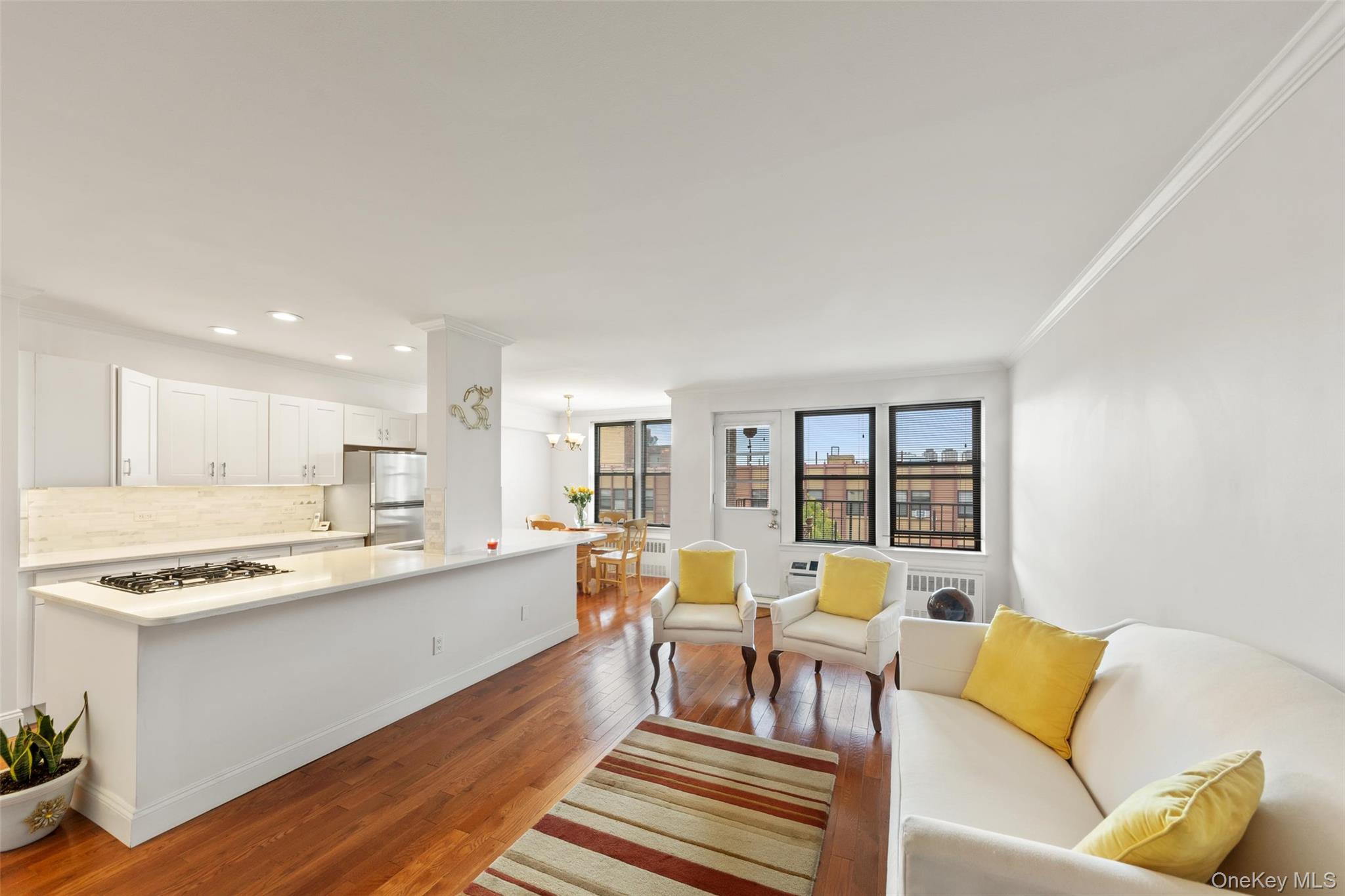 Move right into this stunning, immaculate and turnkey 1 bedroom with terrace in the premier cooperative The Pelham. The open floor plan provides for modern living. The eat-in-kitchen offers quartz countertops and stainless-steel appliances and is open to the expansive living room. The spacious terrace provides a comfortable place to unwind and view the sunset. The bathroom is also fully renovated, and the king-size bedroom offers tons of natural light. There is plenty of storage space available with 4 floor-to-ceiling closets. Standout features of this unit include recessed lighting, new floors and new a/c wall units. The building offers a gym, community recreation room and outdoor patio space as well as laundry facility, inside garage, outdoor parking lot (both by waitlist) and additional storage space in basement. The Pelham is conveniently located on Pelham Parkway South overlooking the trees along the parkway and is just a short walk to #6 train, bus hub to Queens and Westchester County. Easy vehicle access to I-95, Hutchinson River Parkway, Throggs Neck and Whitestone Bridges.The Pelham is 100% debt free with no underlying mortgage. The premises are extremely well kept with live-in super who takes pride in his building. Look no further this is the best coop on the market in Pelham Bay.