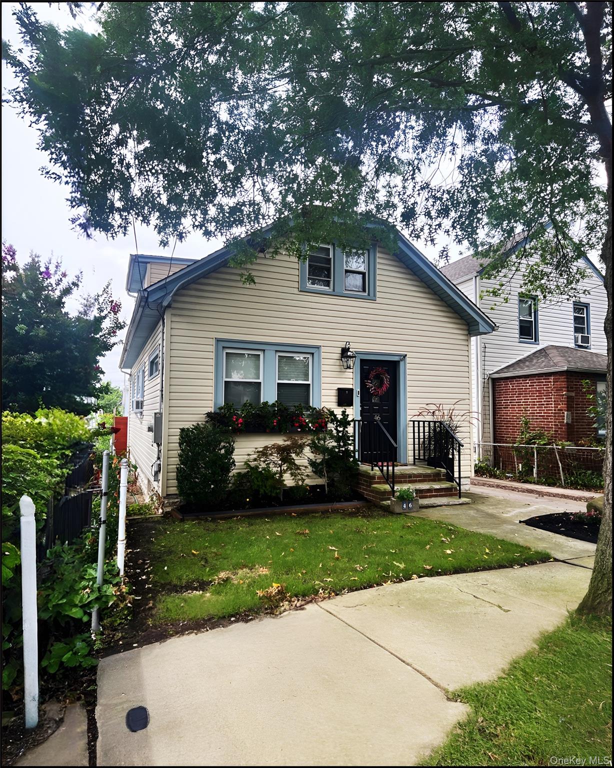 Charming four-bedroom Cape Cod-style cottage located in the heart of Franklin Square, featuring a spacious foyer and mudroom to meet all your needs. The property is move-in ready. The living room includes an electric fireplace and a smart thermostat. The first floor offers a bedroom and a versatile office space that can function as a bedroom. The updated kitchen is equipped with smart stainless steel appliances, pull-out drawers, spice racks, garbage bins, a gesture-controlled range hood, and a bright dining area. The modern bathroom has been recently renovated for added luxury. Upstairs, there are three generously sized bedrooms with ample storage space. This home is conveniently situated near numerous amenities, including public transportation along Hempstead Turnpike, and Polk Street Elementary School. The property also features a full unfinished basement with an outside entrance, a gas boiler, a new water heater, and a new large-capcapacity smart washer and dryer.