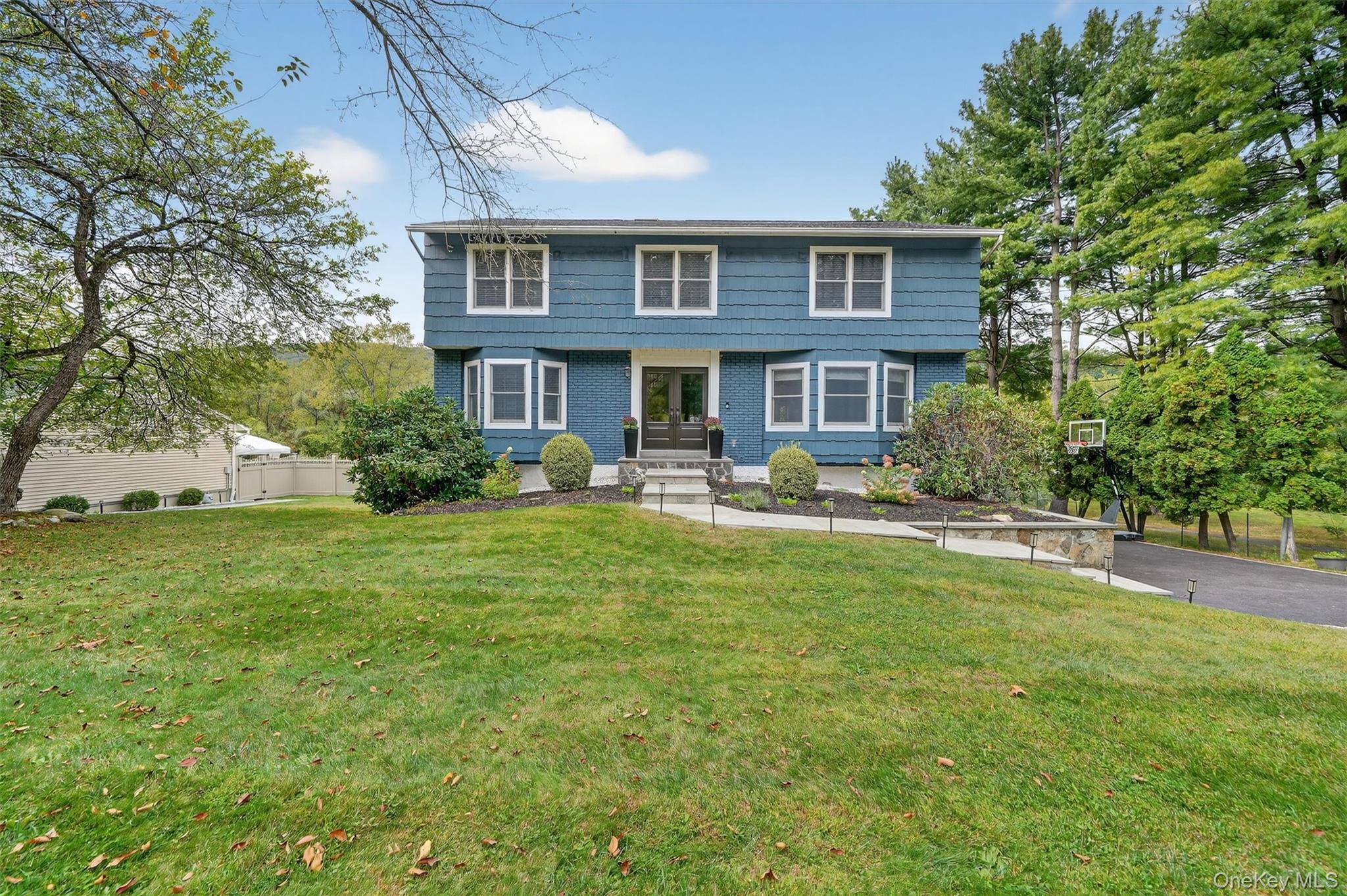 Thoughtfully expanded and modernized, this Colonial style home is located in the highly sought-after Countryside neighborhood. This property effortlessly combines the perfect combination of gathering places and private spaces. Oversized sunlit rooms offer the perfect entertainment flow, complete with a fireplace, deck access, and oversized formal dining room perfect for festive gatherings. The chef&rsquo;s kitchen is a standout feature with its elegant wood cabinetry, granite countertops, stainless steel appliances, and a expansive center island. The primary suite provides a luxurious retreat with a walk-in closet and a spa-like bath offering picturesque views. 3 additional bedrooms + a hall bath are located on this level. The versatile lower level is ideal for extended family or guests, featuring a separate family room, guest room, kitchenette, and full bath w/ a door to the patio and fenced yard. Recent improvements from 2017 to 2025, include a new roof, new driveway, new walkway, updated interior railings, CAC, exterior fencing, hot water tank, patio, pool deck, lighting, double door entry plus interior/exterior painting all which enhance its appeal. Situated on a level .46-acre lot, the home offers a private outdoor paradise with a bluestone patio, deck, above-ground pool and convenient 2 car garage w/ plenty of extra parking. Municipal water, sewers, NYSEG plus benefits from the STAR discount of $1802 which is not reflected in the taxes, this home is perfectly designed for todayâ€™s lifestyle!