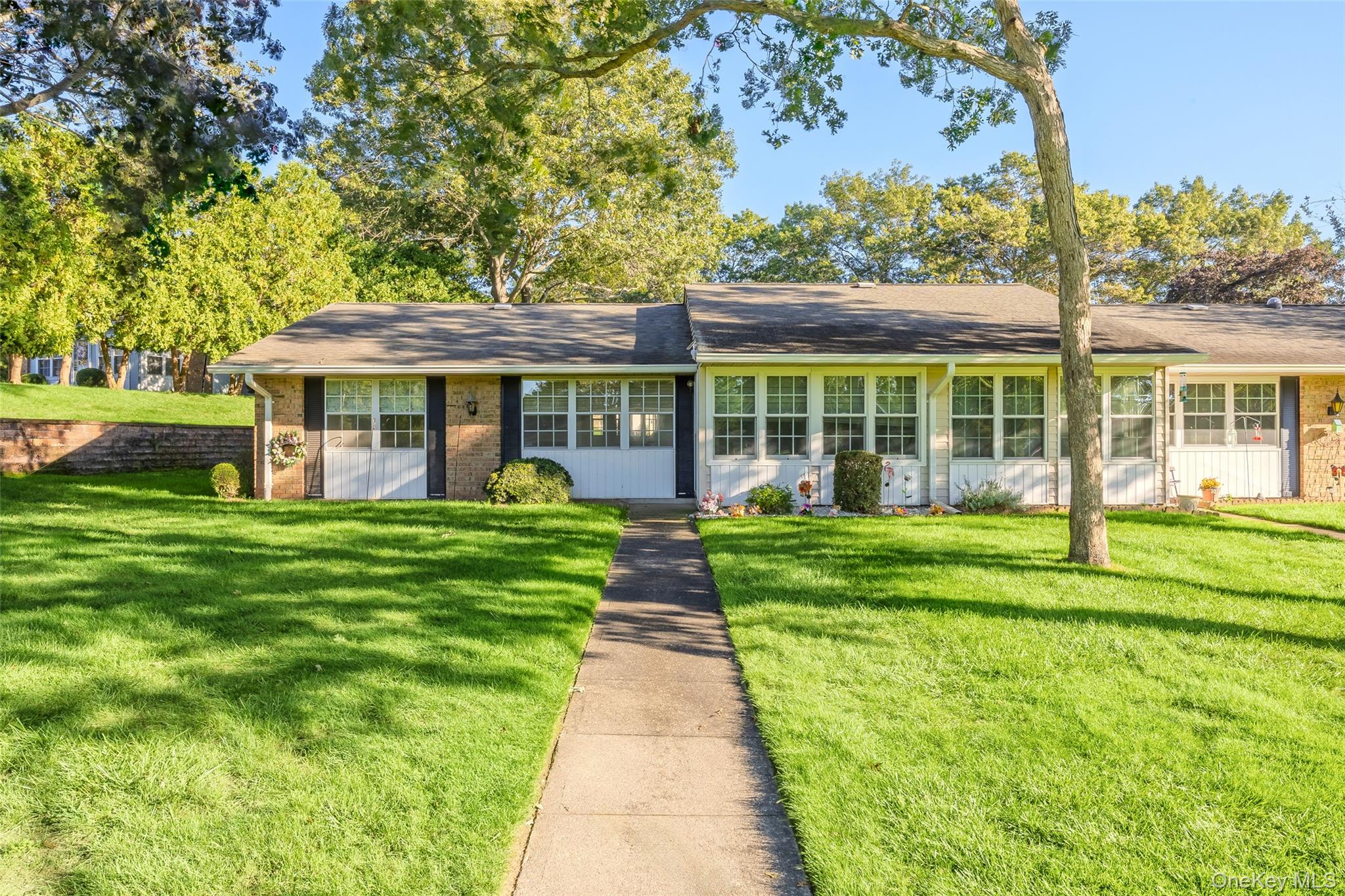 Enjoy a carefree lifestyle in this desirable 55+ gated community! This well-maintained Cambridge model features a bright kitchen with granite countertops, some newer windows, and a newer washer and dryer. Additional highlights include a newer electric panel, garage for extra storage, and a delightful sunroom that welcomes in southern lightâ€”perfect for morning coffee or relaxing afternoons. The beautifully kept exterior with garden beds and mature plantings adds charm and curb appeal.Leisure Village offers 24-hour gated security and an abundance of amenities, including a clubhouse, pool, golf, fitness center, and a wide variety of social activities. Monthly maintenance covers landscaping, snow removal, exterior maintenance, use of the clubhouse, and much more!