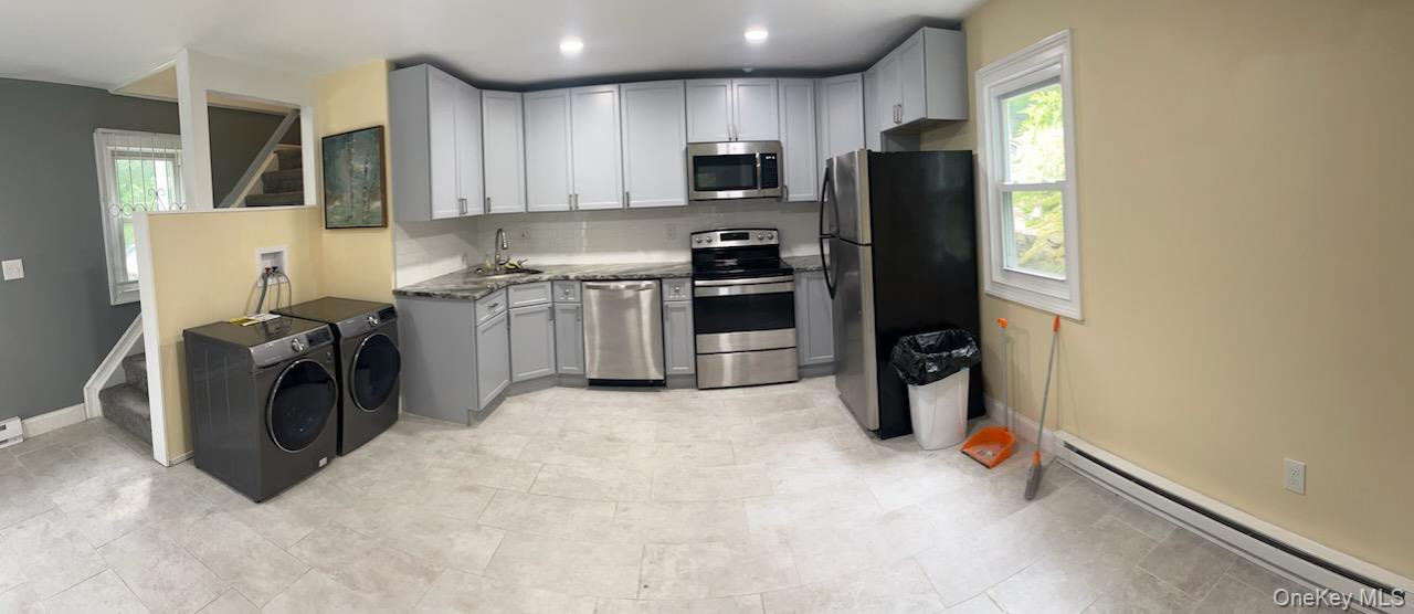 2-Story Accessory Unit  Updated Kitchen & Bath  DW + In-Unit W/D  Private Entrance  Outdoor Sitting Area  Designated ParkingTucked away facing trees and greenery, this bright, two-level accessory apartment feels calm and private. The main floor offers open living/dining and an updated kitchen with full-size appliances including a dishwasher. Upstairs youâ€™ll find the sleeping area and an updated bath. Enjoy an in-unit washer & dryer, good closets, easy-care flooring, and warm natural light throughout.