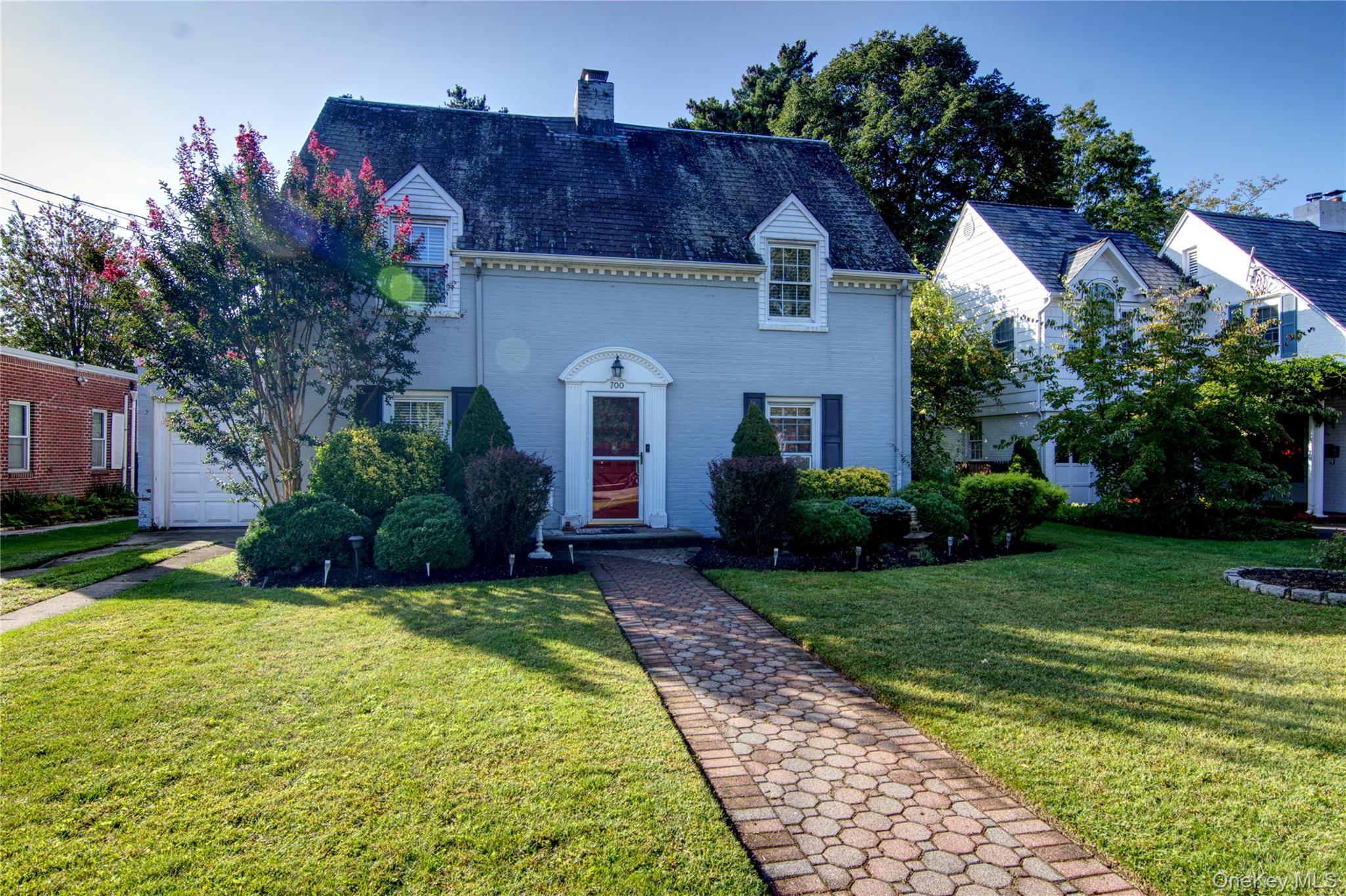 Welcome to this classic Colonial home in the heart of Baldwin that perfectly blends timeless charm with modern comfort. Featuring 3 spacious bedrooms and 1.5 bathrooms, this residence offers an inviting layout designed for both everyday living and entertaining.Step inside to discover gleaming hardwood floors and two cozy fireplaces, creating warmth and elegance throughout. The gorgeous living room opens up the the beautiful backyard. The bright, updated kitchen boasts stainless steel appliances, abundant cabinetry, and sleek granite countertops, making it a true centerpiece of the home. The dining room features lots of space for special gatherings.Upstairs, youâ€™ll find generously sized bedrooms with ample closet space, providing comfort and convenience for the whole household. The beautifully updated full bathroom offers practical use in addition to a relaxing soaking tub. The attached one-car garage adds practicality, while the expansive parklike property offers endless opportunities for relaxation, gardening, or outdoor gatherings. The home features IGS, 200 Amps Service, and Amazing Curb Appeal!This Colonial is more than a houseâ€”itâ€™s a home with character, style, and room to grow.