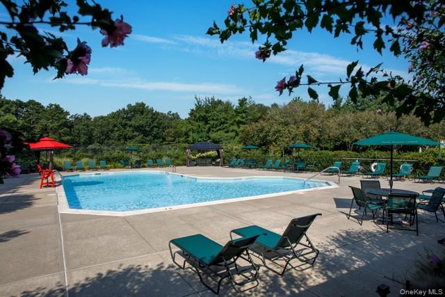 Ask about our specials **Gated, tranquil, Storage avail. Clubhouse, Fit Ctr. Heated pool/sundeck, tennis, playgrd. White shaker cabs w/undermt led lites, quartz ctrtp/backspl.SS appl.Hi-hats.Ceil.Fans.W/D.CAC. vinyl plank flrs. Gray paint.Custom closets.Terrace.Sunrise Hwy, Rte.27A, SS Pkway. Nr.shops, dining, parks, beaches, golf. Nr. LIRR Ronkonkoma, MacArthur Airport. Resort Style.