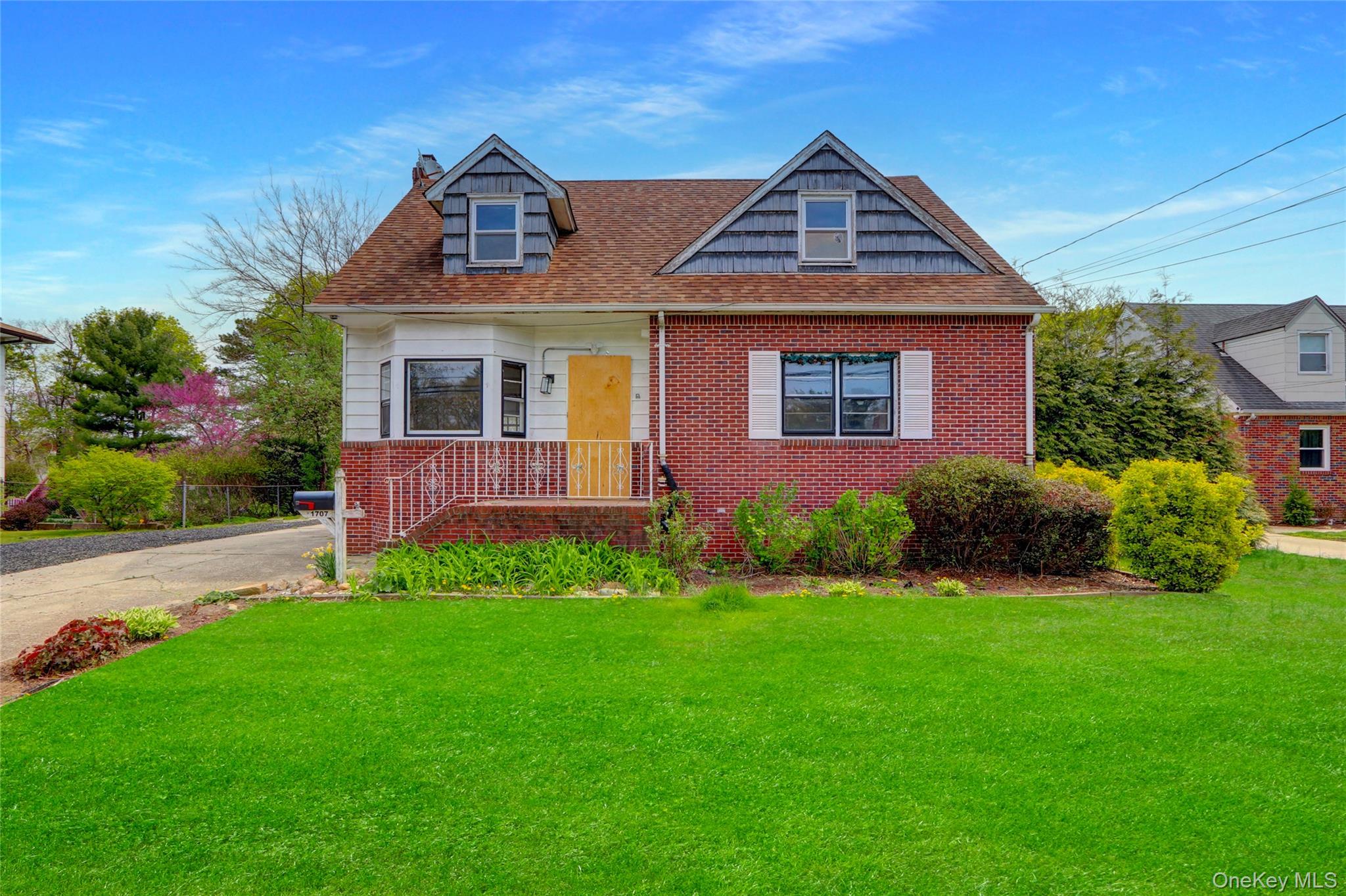 Large cape cod style home with full basement, having a great backyard, spacious bedrooms, and exceptional potential. Close proximity to parkways, schools, shops, eateries, parks, and other area conveniences.