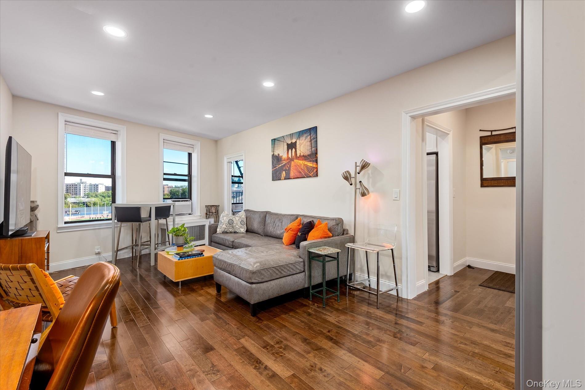 Mint One Bedroom With Wide Open ViewsMove right into this freshly gut-renovated one-bedroom home with bucolic wide-open views from every window. Truly everything has been done AND DONE BEAUTIFULLY! In the kitchen youâ€™ll find plentiful storage and counter space with a space to eat next to the window. White shaker-style cabinetry, subway tile back splash, dishwasher, quartz counters illuminated by under-cabinet lighting, full-sized stainless appliances, self-closing drawers, and underfoot, new tile flooring. Please note: While the kitchen stove is included with the apartment, the freestanding professional steam oven and adjacent cabinet seen in the photos are not included in the sale.In the large living room, there is enough space for a comfortable dining area along with floor space to accommodate a sofa and entertainment center.The king-sized bedroom has two closets, one of which is a roomy walk-in.The windowed bathroom renovation gives you floor to ceiling marble tile, and tub enclosure with rainfall shower, low flush toilet and recessed lighting. The newly skim-coated walls are flawless. New wooden flooring throughout, baseboards, radiator covers and recessed lighting powered by new electric and wiring. The northern artistâ€™s exposure gives you wonderful light all day long with views of Columbia Baker field, Inwood Hill Park and the Henry Hudson Bridge.Pet friendly, wonderful live-in super, laundry, bike storage in the building, and new video intercom system.Easy access to A and 1 subway lines as well as Metro North and Marble Hill, Marshallâ€™s, Target, Planet Fitness all a short distance away. Donâ€™t forget to stop by the Saturday Farmerâ€™s Market on Isham Street while you are here! Inwood Hill Park offers many walking trails, tennis and basketball courts, playgrounds, and the new nature center, plus lots of rolling lawns to accommodate your picnic blanket.Additional monthly fuel assessment of 103.94/mo thru 12/31/2025