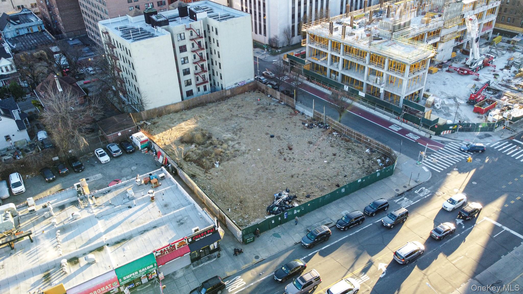 Seize this exceptional opportunity to transform a prime corner lot into a landmark development in the vibrant heart of Jamaica, Queens. Expansive 154FTx119FT lot with R6A, C4-5X, DJ zoning, comes with an approved plan for an impressive 185, 000 square feet of a 13-story mixed-use building, showcasing a remarkable 100-foot-wide frontage on bustling Hillside Avenue. Also, features 60, 000 sq. ft. commercial space at the Basement, 1st, 3rd & 4th floors, 15, 000 sq. ft. indoor In & Out Parking on the 2nd floor, and 99 residential units designed to maximize livability and appeal. Located steps away from the 169th St subway station, bus terminal, and a thriving array of shops, restaurants, supermarkets, schools, banks, and parks, this location is a gem! Premier location offering unparalleled potential to create a transformative project in a thriving urban hub - Act now!