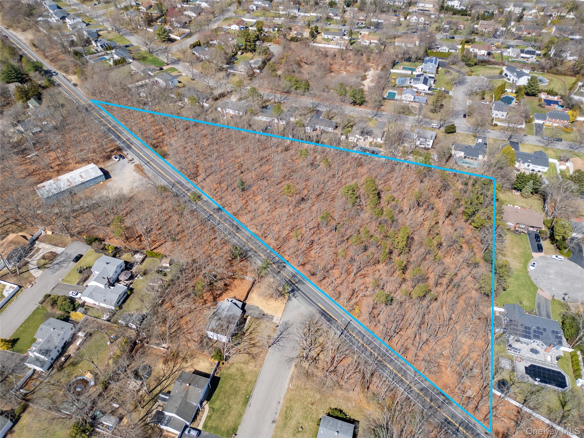 Builders, developers, and dreamers â€” hereâ€™s your chance! This expansive 2.8-acre wooded lot sits in a beautiful residential neighborhood, surrounded by stunning homes and connected to Public Sewers for added convenience.Zoned A1 Residential with approx. 122, 839 sq. ft., this property offers incredible potential: subdivide into multiple lots, design new homes, or explore town-approved development opportunities like townhouses or condos.Whether youâ€™re looking to create a thriving new community or make a smart investment, this is a rare find in a highly sought-after location.