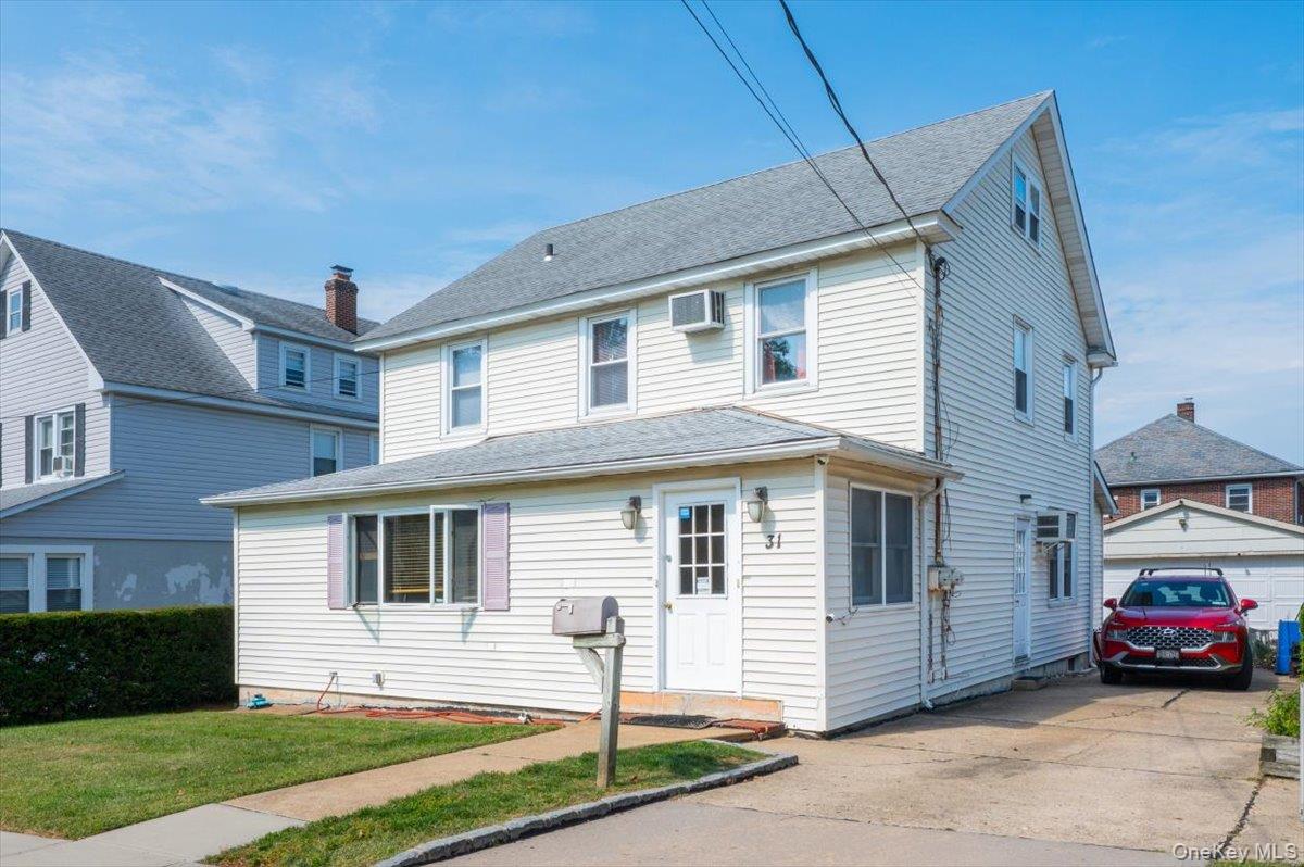 Exceptional opportunity to own a legal two-family home in one of Glen Coveâ€™s most convenient locations! Perfect for both investors and end-users, this versatile property offers strong rental potential and flexible living arrangements.The first-floor unit features 2 bedrooms, 1 full bath, an eat-in kitchen, and a generous living room, while the second-floor unit mirrors the layout with another 2 bedrooms and 1 full bath. Both units are filled with natural light and offer comfortable living space.The home is set on a quiet residential block and includes a private driveway with multiple parking spaces, a backyard ideal for outdoor enjoyment, and low-maintenance vinyl siding. Just minutes from schools, parks, restaurants, shopping, beaches, and the LIRR, this property combines convenience with long-term value.
