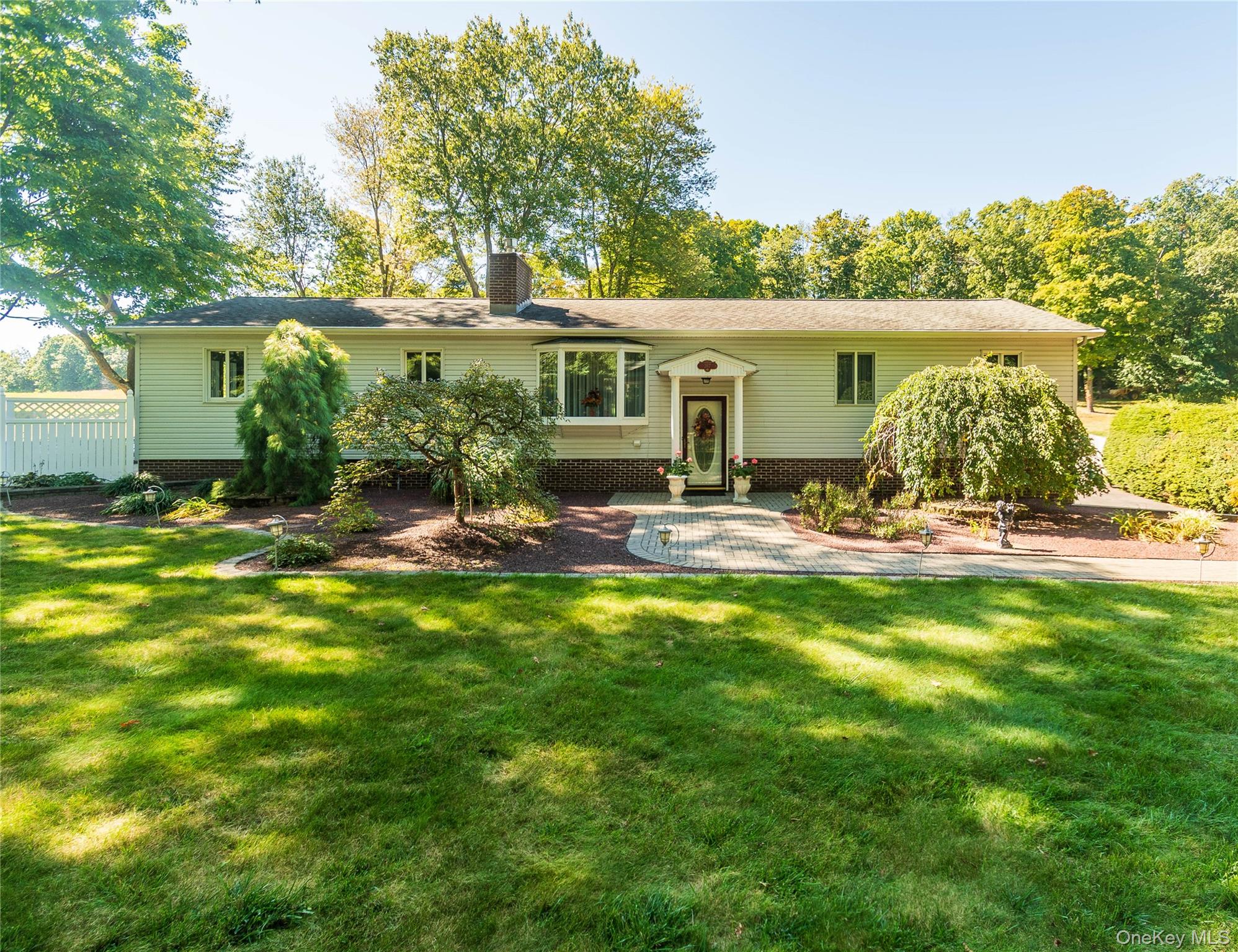 This is an absolutely must-see property. The original owners have decided to sell their exceptionally well-maintained home which is situated on almost 4.5 acres on a quiet road in beautiful Pleasant Valley N.Y. These owners left no detail unattended. From the efficient drainage system, to the beautiful gardens to the hand-built dry-fitted stone walls that adorn the property every detail has been thought out and properly executed. This is an expansive ranch style home with an attached 1 car garage and a detached garage that can fit as many as 3 cars if the lift is employed....yes, there is a car lift, and there is still room for a workshop in this heated, spotless garage. Adjacent to the garage is a 2 stall horse barn with a hay storage area. Large fenced paddocks are adjacent to the barn and the property is fully fenced in for privacy, pets and small children to roam safely. Along the front of the house there is a natural privacy screen comprised of beautiful trees. This home features a whole house automatic generator. The septic tank and the oil tank are new. There is nothing to do with this home except move in and start enjoying all the benefits of the bucolic setting while still being only 10 minutes or so from the Taconic State Parkway. We can guarantee that any visitor to the property with be absolutely impressed by what this home has to offer.