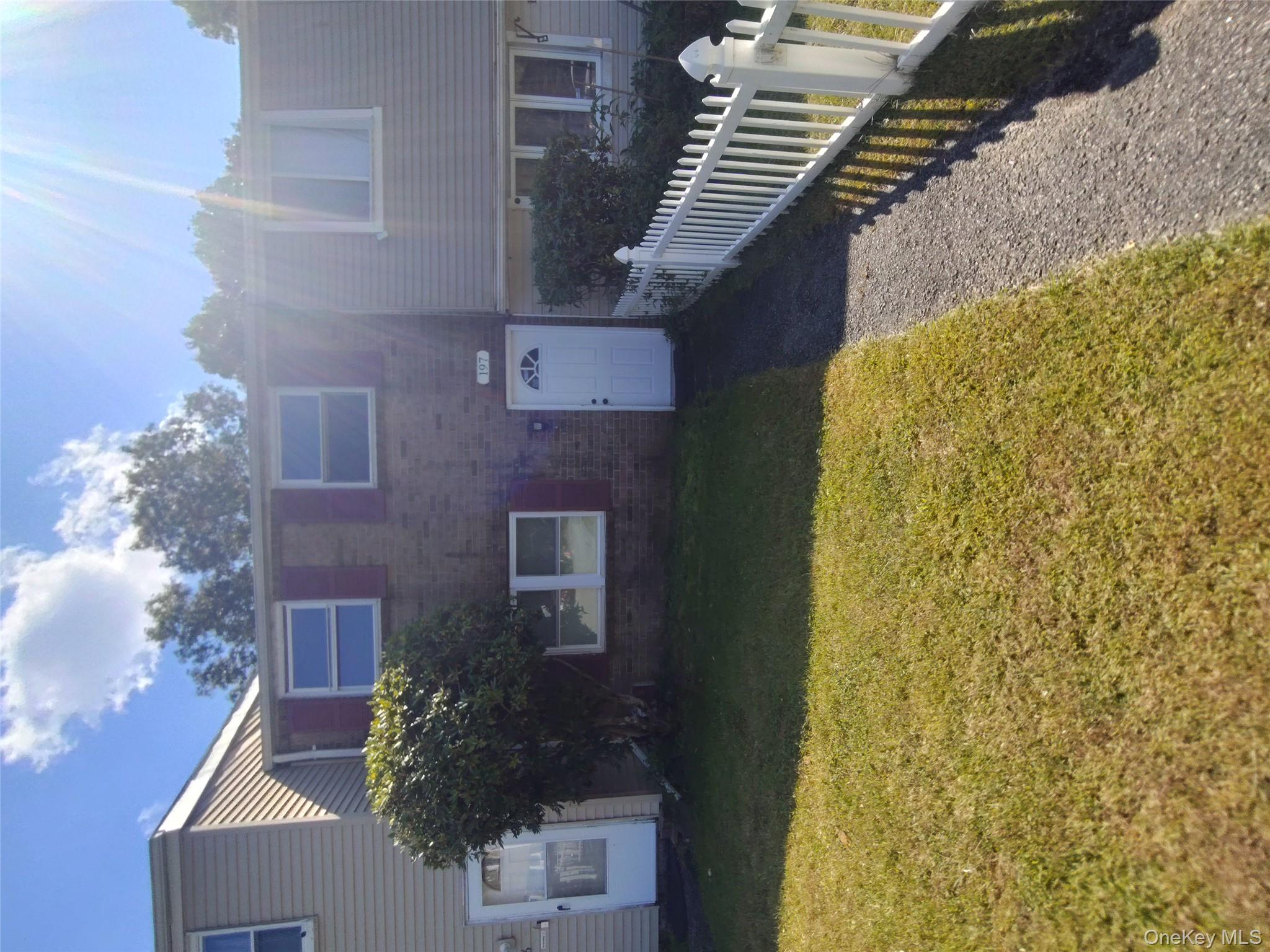 Great opportunity to own this two-level brick faced townhome in a gated community just off the Long Island expressway! Recently updated with fresh paint, new kitchen with all new appliances to include dishwasher and W/D! Large living room with sliders to rear enclosed patio that backs the preserve! Lots of storage, large full bath with tub on 2nd floor, half bath on 1st! Laminate flooring throughout, great floorplan! Monthly maintenance $350.00. This is a homeowners association. Low taxes too! Close to downtown Riverhead, outlets and all shopping needed! 2nd floor bedroom has sliders to balcony overlooking the preserve! Pull down attic for extra storage too! Move right in! Verify all info supplied. Also for rent @ $3500 per mo. Central air needs repair. Being sold as is seller makes no representations