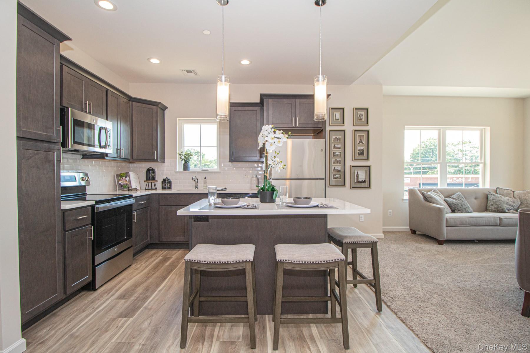 Gorgeous 2 bed 2 bath unit. Second floor unit with a loft. Quartz counter tops stainless appliances. Washer/dryer in unit and a beautiful community room with outdoor patio.