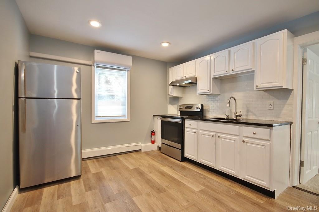 Beautiful 2-Bedroom Apartment with All Utilities IncludedMove right into this updated second-floor 2-bedroom, 1-bath apartment offering comfort, convenience, and modern finishes.This home comes fully equipped with new carpeting, stainless steel appliances, granite countertops, and recessed lighting. Stay comfortable year-round with new mini-split central air units and enjoy hassle-free living with all utilities and free Wi-Fi included.Donâ€™t miss out on this rare rental opportunityâ€”modern upgrades and utilities included all in one place!https://apply.link/QYe1SV0Additional features:Private parking includedYard access for outdoor spaceSnow removal, lawn care, and trash removal providedPrime location near shopping, dining, and major highways for easy commuting ANY QUESTIONS CALL LISTING AGENT PETE 347-697-9990