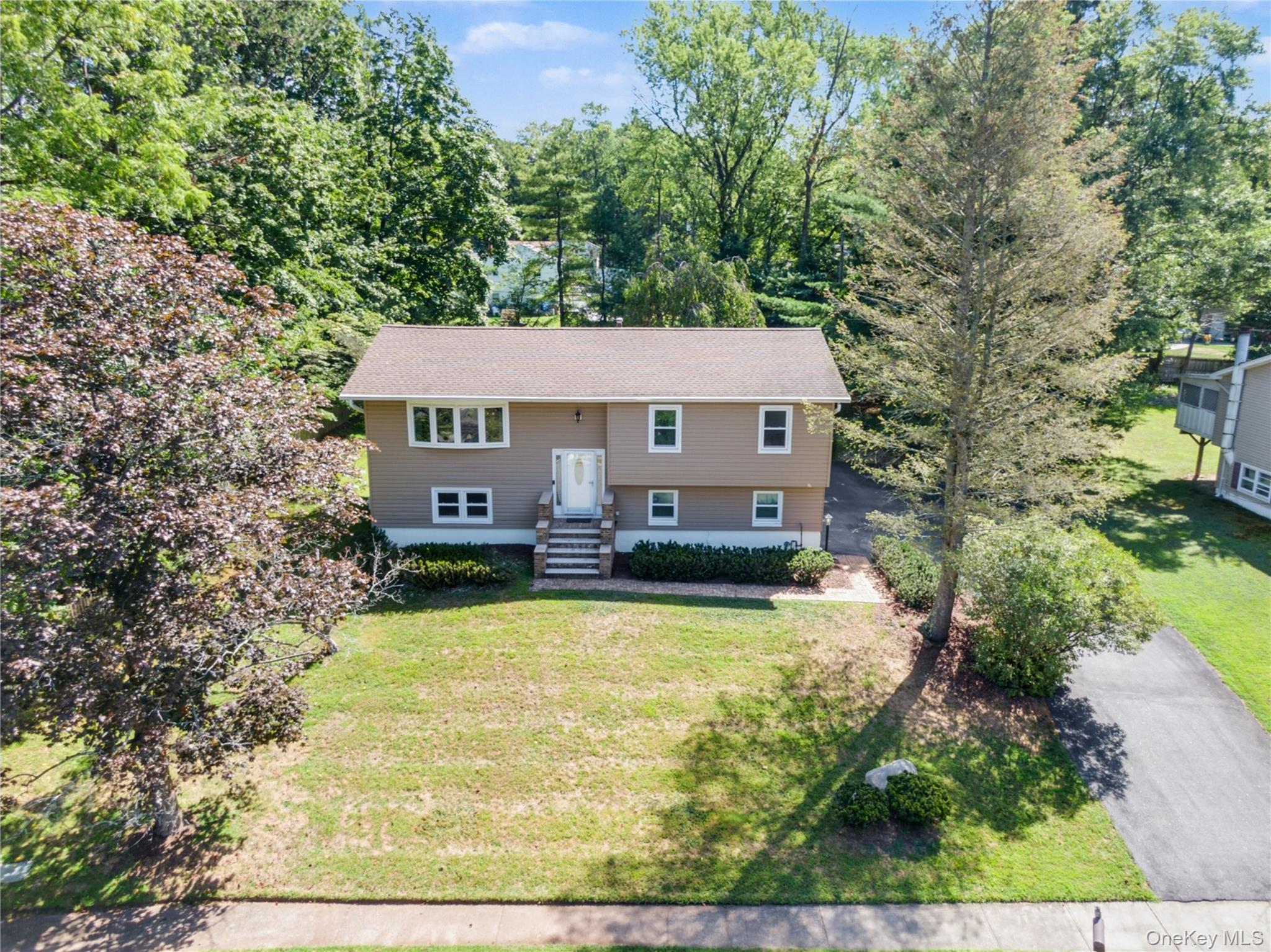 Welcome to 10 Headden Drive! Step inside to the main level, which features a living room, dining room, and kitchen with stainless steel appliances. This level also offers 3 bedrooms, 1 full bath, and 1 half bath. The primary bedroom includes a walk-in closet, an en suite half bath, and an additional closet, with many more closets thoughtfully placed throughout the home for ample storage. The lower level expands your living space with an additional bedroom, a three-quarter bath, a media room, and a versatile extra room currently being used as a gym, perfect for hobbies, guests, or a home office. Outside, enjoy the convenience of a deck and a large driveway with space for multiple vehicles. Set on .35 acres, the property boasts a beautiful front and back yard with plenty of room for outdoor living, gardening, and entertaining. This lovingly cared for home blends comfort, storage, and flexibility, making it an ideal choice for today&rsquo;s lifestyle. Don&rsquo;t miss the chance to make it yours!