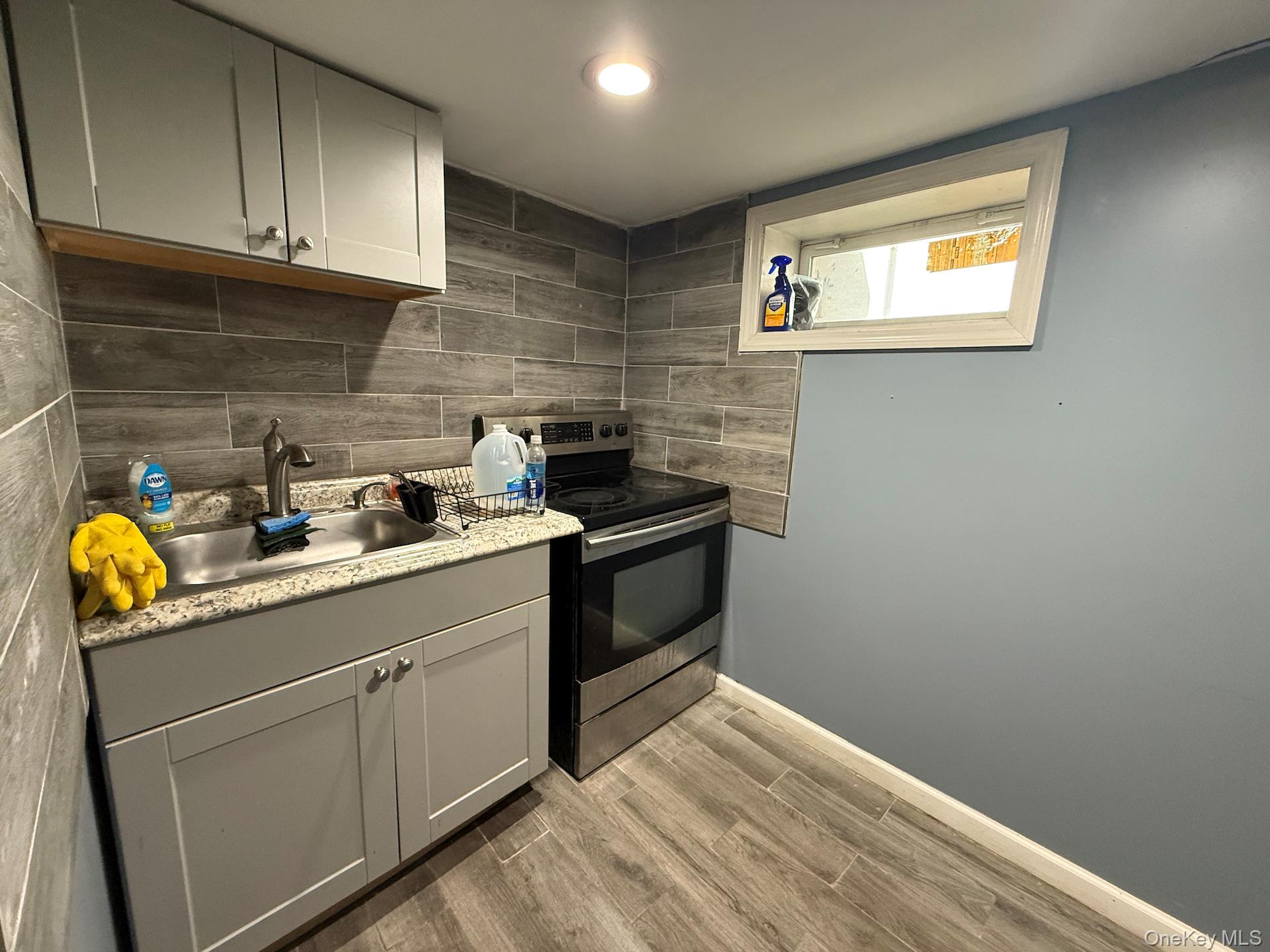 Studio lower Level; Washer/Dryer, Central A/C; all included; plenty of street parking. Available Immediately