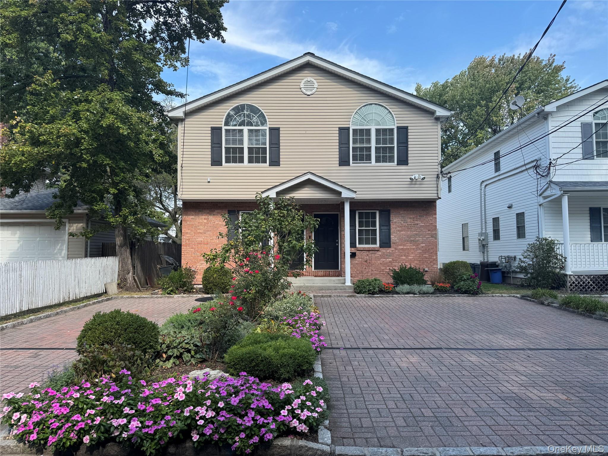 Spacious Duplex in Manhasset Isle. First Fl: Entry Foyer, Half Guest Bath. Kitchen opens to Dining Area, offers Stainless Appliances, Oak Cabinets, lots of counter space and storage. Spacious Living Room W/Sliders to private Deck and Fenced Yard. 2nd Fl: Primary Bedroom with Full Bathroom, Ceiling Fan, two large Closets. Additional Bedroom, Ceiling Fan, Large Closet and Full Bathroom. Basement Laundry Includes Washer/Dryer, and lots of storage space. Off-street Driveway Parking for One Car. Very Private Location on Tree Lined Street. Convenient to Shopping Centers, Starbucks, Restaurants, Public Transportation, Marinas and Manorhaven Park with Pool, Tennis, Kayak & Boat Ramp, Picnic Areas and Beach.