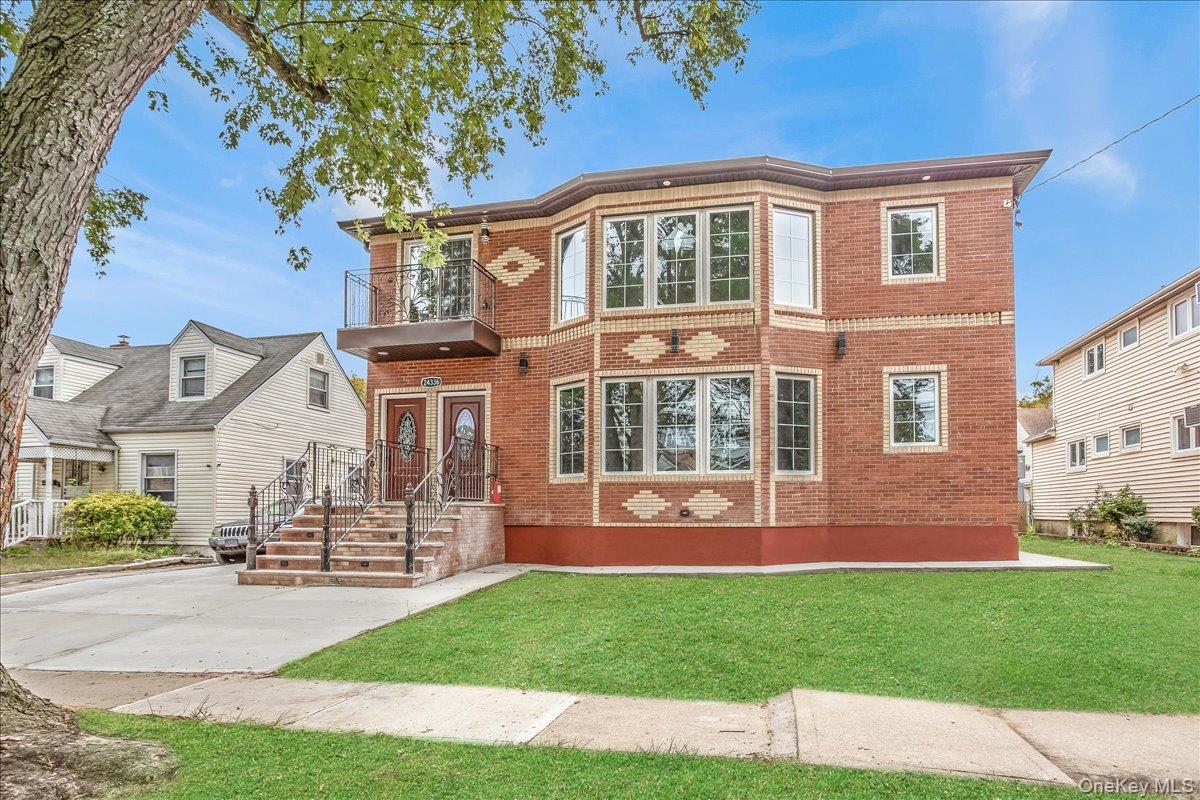 New two Family Solid brick Mid-block: driveway, garage.First floor Features 5-bedroom 2 full bath Livingroom dining room eat in kitchen. wall to wall solid wood floors. Second floor features 5 Bedroom 2 full bath Livingroom dining room eat in kitchen wall to wall wood floors. Balcony Basement: full finished open spaced: with one full bath, Laundry.