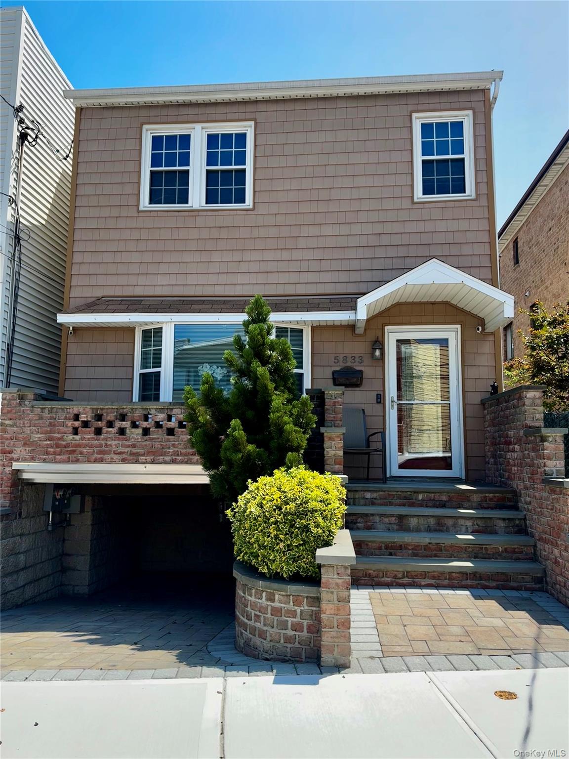 Welcome to 58-33 71st Street, a distinctive single-family residence in Maspeth that stands out for its luxury compared to others in the area. Tucked away on a quiet, tree-lined street, this move-in-ready home has been completely renovated with high-end finishes and thoughtful design, blending sophistication with everyday comfort.The property offers nine rooms in total, including three spacious bedrooms and two full baths. Natural light fills the open-concept living space, making it ideal for daily living and entertaining. From the kitchenâ€™s sliding doors, step onto a private deck that leads to a poolâ€”an inviting space for relaxing or hosting guests.Situated conveniently near top-rated schools, neighborhood parks, shopping, and public transportation, this home delivers a rare combination of luxury, practicality, and lasting value in the heart of Maspeth.
