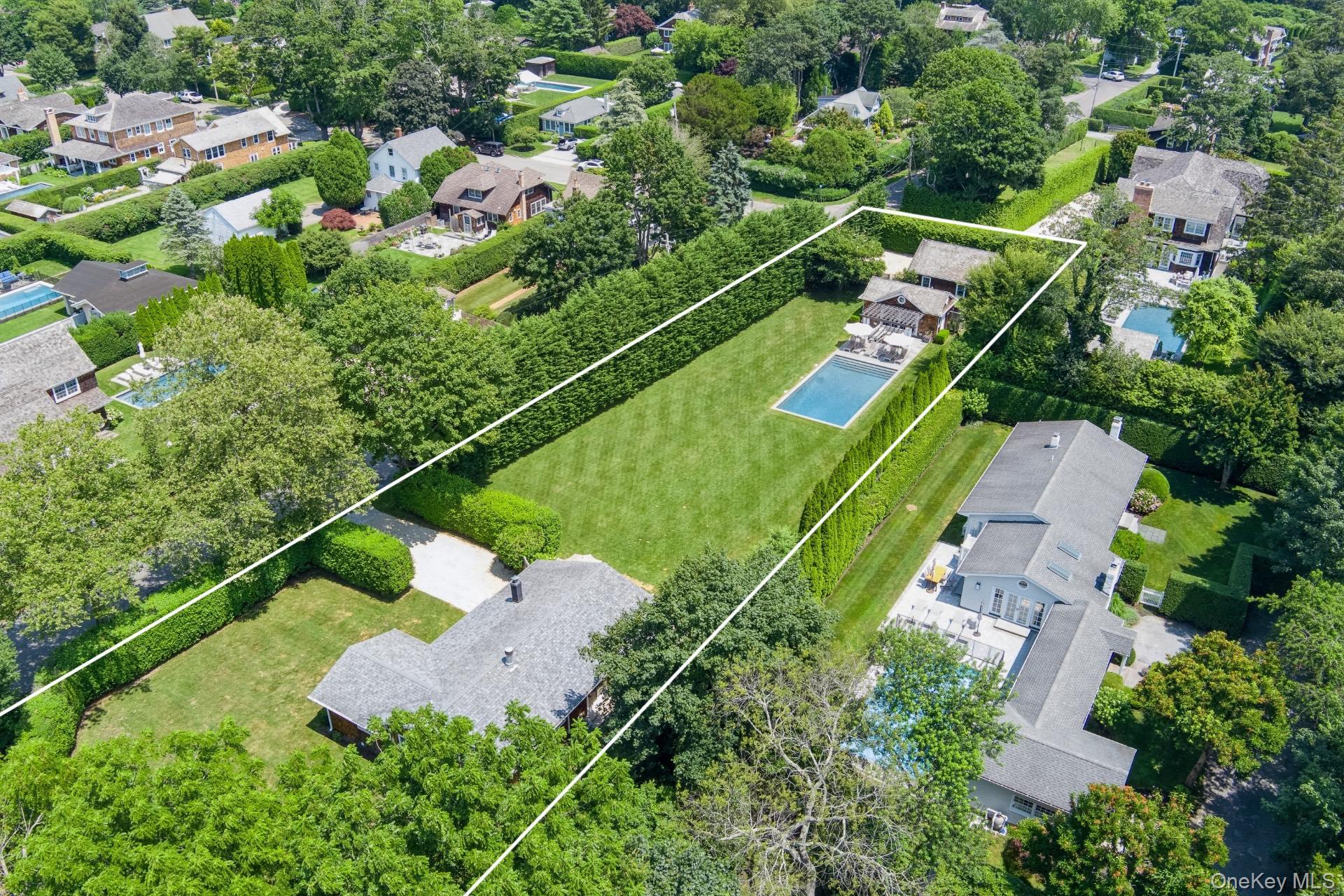 At .61 of an acre, 64 Armande is nearly 3 times larger than many other homes on the market in Southampton Village. A truly unmatched triple-lot that stands alone in its beauty, privacy, and potential. Framed by mature 20â€™ cypress hedge on the south side and a towering 60â€™ arborvitae hedge on the north, this expansive and impeccably manicured property is a private East End sanctuary. At its center sits a charmingly updated three-bedroom, three-bathroom home, where timeless elegance meets modern comfort. Sun-drenched interiors, custom finishes, and a seamless flow to the outdoors create a perfect setting for relaxed coastal living and effortless entertaining. The open-concept living and dining spaces are anchored by a custom fireplace and connect directly to the lush backyard through huge oversized sliding doors. A gourmet kitchen is outfitted with top-tier stainless steel appliances, bespoke cabinetry, and refined fixtures. The gracious primary suite with ensuite bath, two guest bedrooms, and an additional full bath round out the main level, with untapped potential in the lower level awaiting your vision. Step outside and discover the true heart of the estate: an expansive triple-lot features a 20&rsquo; x 40â€™ saltwater gunite pool surrounded by bluestone patios, an arbor for shaded lounging, and the most spectacular, elegantly appointed pool house. The newly added structure is designed with soaring cathedral ceilings, a kitchenette, full high-end bathroom, and outdoor shower, the pool house is the ultimate complement to summer days and nights. A newly added detached two-car garage with its own private driveway offers ample space for vehicles, bikes, and beach gear, enhancing the functionality of the estate. Unique to this offering are ARB-approved architectural plans for a magnificent 5, 594-square-foot residence with six bedrooms and six-and-a-half baths, saving you months and months of time and considerable architectural costs. Whether you&rsquo;re looking to expand upon the current home or envision building your own bespoke retreat, the possibilities are truly endless at 64 Armande. Just moments from world-renowned beaches, fine dining, boutique shopping, and the best of village life, this property represents a rare chance to own a generational compound in one of the Hamptons&rsquo; most prestigious enclaves.