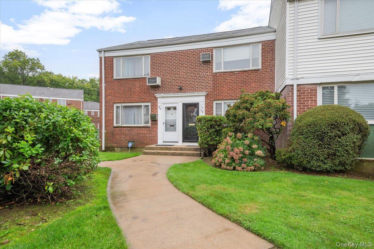 Welcome home to this two-bedroom, one-and-a-half bath brick townhouse featuring an updated kitchen with stainless steel appliances, updated bathrooms, spacious living room, dining area, private deck in back, finished attic for storage, hardwood floors, recessed lighting, and a parking space. Convenient location near schools, shopping, and transportation.