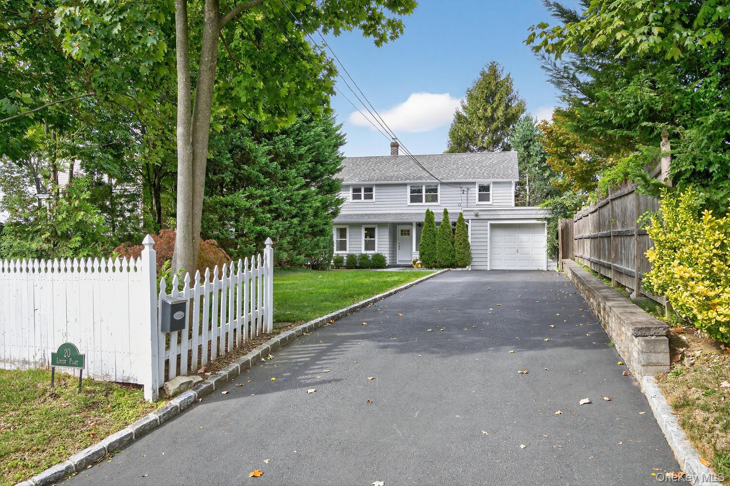 Built in 1914 and thoughtfully updated, this charming 3-bedroom, 2-bath home combines historic character with modern style. The first floor showcases authentic pine floors, while the updated kitchen features quartz countertops, stainless steel appliances, and a classic tile backsplash. This well maintained home and its close proximity to Locust Valley village, makes it an ideal blend of timeless appeal and modern day comfort.