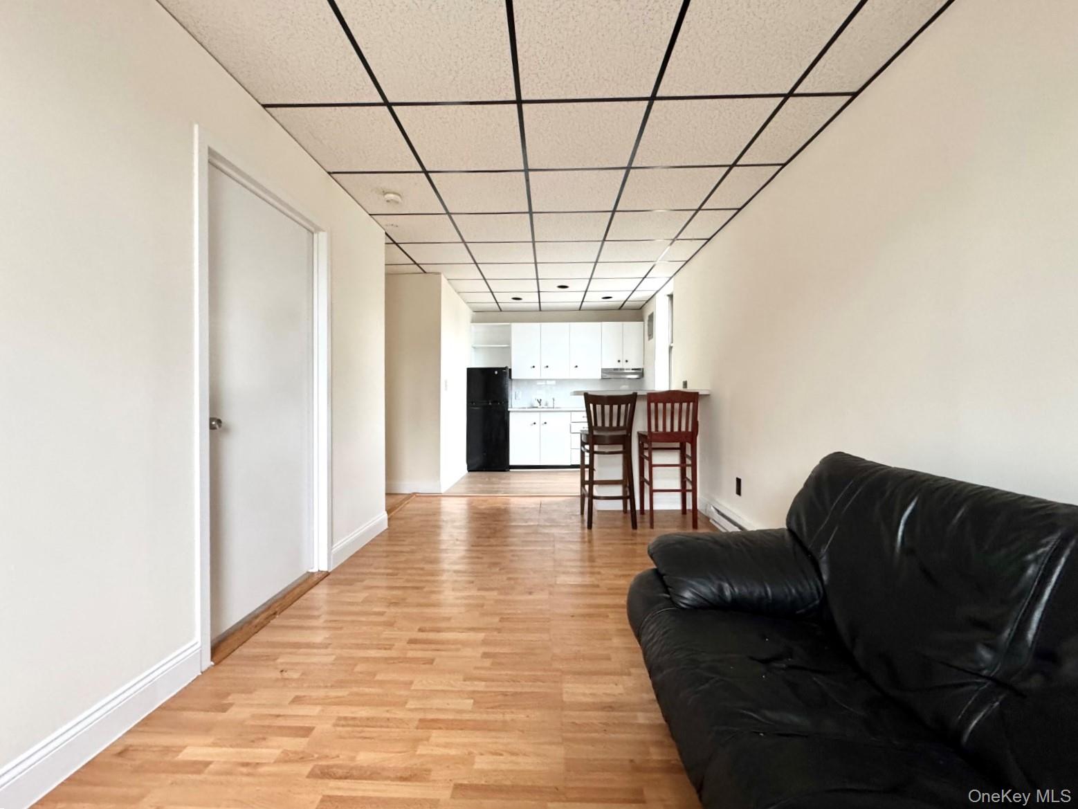 Newly renovated one bedroom apartment on second floor with lots of natural light featuring a living room, dinette, kitchen, and a full bathroom. Short distance to LIRR, transportation, and bus lines.