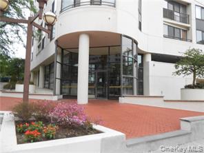 Commuter&rsquo;s Delight! Spacious sun-lit one bedroom one bath in desirable Concierge building. Features include cherry hardwood floors, updated kitchen with stainless steel appliances, Central A/C, Steps away from all that White Plains has to offer. Minutes to City Center, Westchester Mall,  Dining, Metro North RR and Bus terminal, Shopping, laundry on each floor, Penthouse fitness center, Sauna,  Indoor garage parking Space (#52) conveniently located next to elevator. Storage space (53) included. Non-smoking building.  *** Condo requires $500 non-refundable move-in/out fee/$200 non-refundable administrative fee.