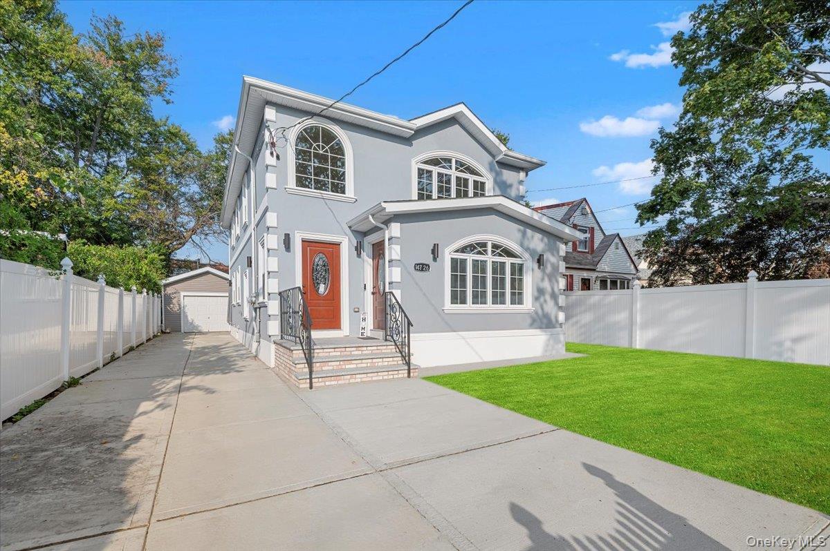 Welcome to this stunning fully renovated two-family house, where modern elegance meets exceptional functionality. Completely redone, this property offers a fresh, contemporary design with no detail overlooked. Each unit boasts three spacious bedrooms and two bathrooms, including a primary suite with a private bath, ensuring comfort and privacy for all residents. The open-concept layout is enhanced by modern finishes and beautiful wood flooring throughout, creating a warm and inviting atmosphere. The kitchens are equipped with stainless steel appliances, making meal preparation a delight while enhancing the contemporary aesthetic. Enjoy the convenience of a private driveway and garage, providing ample parking for residents and guests. The fenced property offers a secure backyard space, ideal for outdoor activities and relaxation. The full finished basement features an outside entrance and includes a full bath, laundry hook-up, and additional storage, adding functionality to the property. Located close to shopping, transportation, the LIRR, and schools, this home is located in an area which offers convenience.