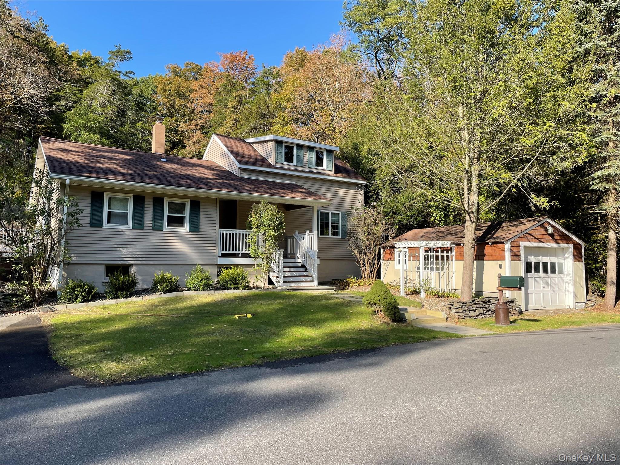 Impeccable, Move-In Ready Home on Over 3 Magical AcresBathed in natural light and surrounded by natural beauty, this stunning 2-bedroom home is the perfect blend of charm, comfort, and ease. This impeccably maintained home is truly move-in readyâ€”no updates or work needed for years to come. From the moment you step inside, you&rsquo;ll be greeted by an abundance of natural light pouring in through the many windows, highlighting the beautiful hardwood floors and open, airy feel throughout. The first floor main bedroom offers a private full bath and a separate office spaceâ€”an ideal setup for remote work or quiet retreat. Upstairs, a large second bedroom doubles as a studio, TV room, or flexible guest space to suit your needs.Outdoor living is just as special. Enjoy peaceful mornings on the welcoming front porch, unwind on the maintenance-free Trex deck, and make use of the dedicated grilling area just off the dining roomâ€”perfect for casual outdoor cooking.The property itself is something truly rare: over 3 acres of sweeping, sunlit lawns, dramatic rock outcroppings, classic New England stone walls, and an abundance of fragrant lilacs that bring a burst of color and scent each spring. Itâ€™s a magical setting that feels like your own private escapeâ€”perfect for gardening, outdoor play, or simply soaking in the peace and quiet. Possibility of second home with a variance. Oversized shed on property for storage of machinery. This is more than just a houseâ€”itâ€™s a sunny, serene haven thatâ€™s been lovingly cared for and is ready to welcome you home.