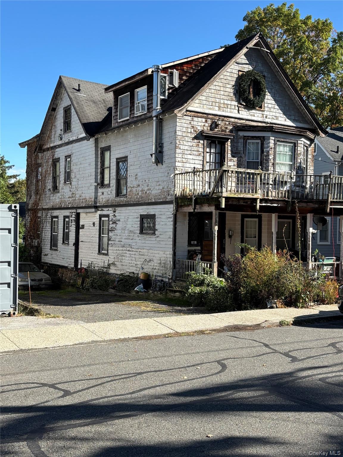 This is a rare opportunity to own a 2-family home in the desirable downtown neighborhood of Nyack! Common entrance leads to 2 doors for each apartment. 2 large apartments: Featuring each 3 bedrooms and 1 full bathroom, plus spacious living room and kitchen. Bonus 3rd floor studio. This spacious 3-story property is in need of full renovation and offers tremendous potential for investors, contractors or ambitious homeowners. Private driveway and yard. Strictly sold as-is/where is.