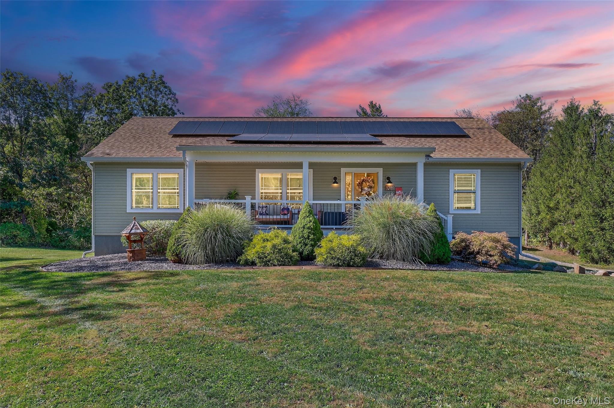 Charming Ranch-Style Home with Solar, Privacy & Designer Basement! Welcome to this beautifully maintained 3-bedroom, 3 full bath ranch-style home, offering the perfect blend of comfort, efficiency, and style. Nestled on a gorgeous, level piece of land, this property is set well back from the roadâ€”providing ultimate privacyâ€”yet is just minutes from the Taconic Parkway, I-84, and the heart of town for easy commuting and convenience. Inside, you&rsquo;ll find an open-concept floor plan with beautiful hardwood floors throughout,  a sunlit living space, and a thoughtfully designed kitchen and dining area thatâ€™s perfect for entertaining. The spacious primary suite is set apart from the other two bedrooms for added privacy and features its own en-suite bath. Enjoy the convenience of main-level laundry, making everyday living a breeze. The fully finished walk-out basement is a standout feature, boasting high-end finishes, a cozy gas fireplace, kitchenette, a beautifully finished full bath, and even a potential 4th bedroom or office space. Kids will love the whimsical clubhouse under the stairsâ€”perfect for play or storage! Step outside to enjoy the beautifully cleared lot accented by stunning natural boulders, a cement patio for outdoor entertaining, and a classic rocking chair front porch where you can relax and unwind. Plus, owned solar panels mean energy savings are yours to keep!Bonus: Architectural plans are available for a future garage and home addition, offering an exciting opportunity to expand and customize this already exceptional home to fit your needs. This home truly has it allâ€”privacy, style, space, sustainability, and potential. Donâ€™t miss your chance to make it yours!