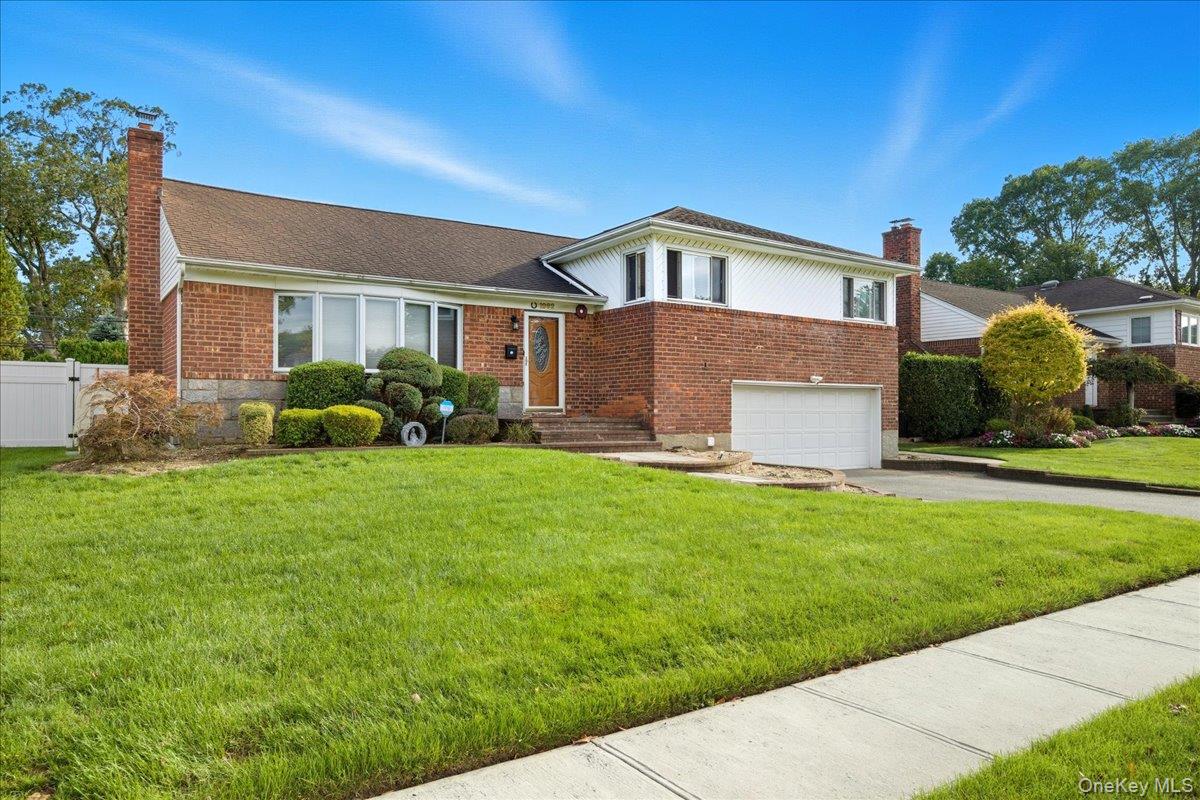 Welcome to this beautifully maintained Split-Level home offering comfort, space, and convenience in one of Salisbury Estatesâ€™ most sought-after neighborhoods.Step inside to find a spacious living room filled with natural light, a formal dining room perfect for entertaining, and an eat-in kitchen ideal for everyday living. Upstairs features two generous bedrooms, a large hallway bath, and an inviting primary suite with a private ensuite bath.The lower level offers a cozy den and half bath, perfect for relaxing or hosting guests, plus a finished basement providing even more versatile space.Enjoy a large backyardâ€”great for gatherings or quiet evenings outdoors. Conveniently located near major highways, the LIRR, and shopping, this home is within the East Meadow School District (Clarke HS/MS & Bowling Green Elementary).