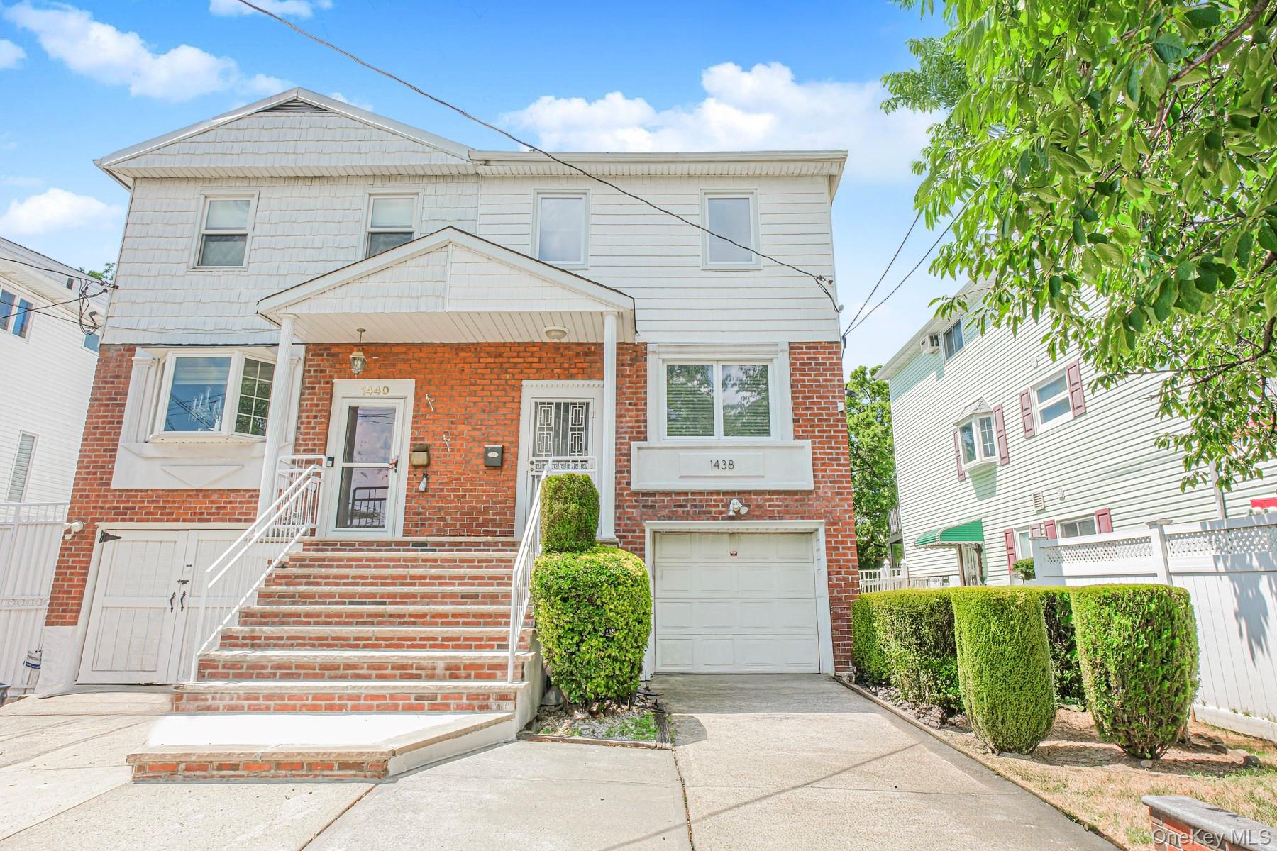 Welcome to 1438 East 70th Street - A Home With Space, Comfort & Charm ? This beautifully maintained single-family home offers a warm and inviting layout with multiple levels of living spaceâ€”perfect for today&rsquo;s lifestyle. Step inside and you&rsquo;ll find a sunlit eat-in kitchen, a convenient full bath, and a dining area that flows seamlessly into the home&rsquo;s centerpiece: a spacious living room with elevated views over the dining spaceâ€”ideal for entertaining or relaxing with family. Upstairs, discover two generously sized bedrooms along with the main bath, followed by the expansive primary bedroom retreat, complete with its own private half bath. The lower level features a cozy family room that opens directly to a large backyard, offering the perfect spot for summer gatherings, gardening, or simply enjoying the outdoors. A utility and laundry room plus direct garage access complete this level for maximum convenience. Throughout the home, hardwood floors lie protected beneath carpeting, waiting to be revealed and enjoyed. ?? Nestled in a desirable Brooklyn location, this home has been cared for and is ready for its next chapter. Don&rsquo;t miss the chance to make it yoursâ€”schedule a showing today and experience its charm for yourself!