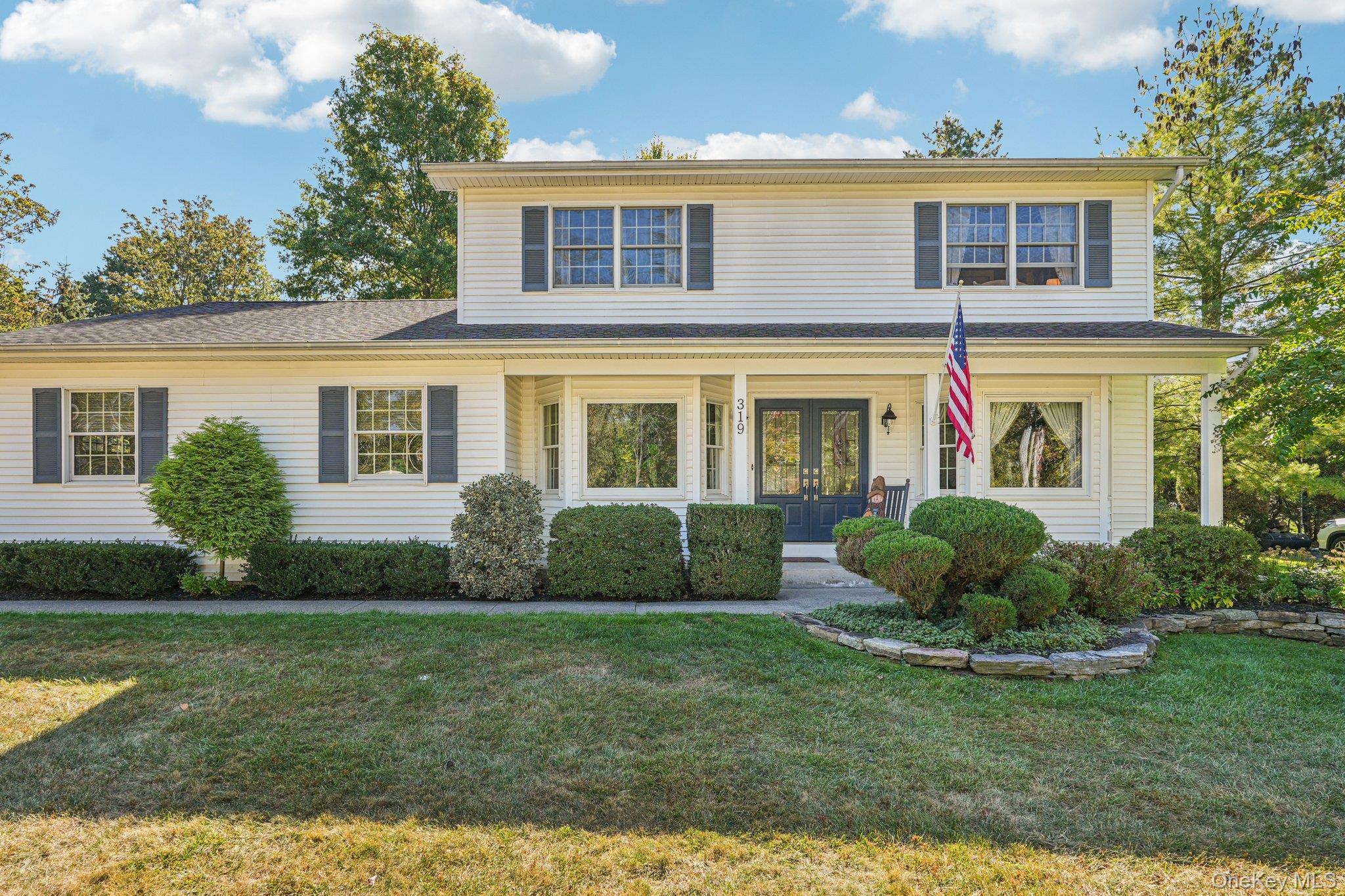 Welcome to Your New Home in Joy Acres â€“ Valley CottageNestled in the heart of Joy Acres, one of the most sought-after developments in Valley Cottage, this beautiful Colonial-style home offers the perfect blend of comfort, space, and tranquility.Situated on a corner, flat lot spanning one-third of an acre, the property is surrounded by peaceful, beautifully landscaped grounds. Adding to the privacy, the land directly across the street is undevelopable.Enjoy the quiet charm of the neighborhood while remaining conveniently close to Liberty Elementary School, Nyack High School, the Palisades Parkway, and the New York State Thruway.Inside, the home welcomes you with an inviting front porch and a spacious backyard patio, perfect for both relaxation and entertaining. It features four generously sized bedrooms and two and a half updated bathrooms, with gleaming hardwood floors running throughout. The large eat-in kitchen opens to a cozy family room, while a formal dining room provides the perfect setting for gatherings. A spacious living room, convenient half bath, and large laundry room complete the main floor.Upstairs, the primary suite offers a fully renovated en-suite bathroom, accompanied by three additional bedrooms and two newly renovated full baths. A walk-up attic provides ample storage space.Come visit this warm and welcoming homeâ€”itâ€™s everything youâ€™ve been looking for.