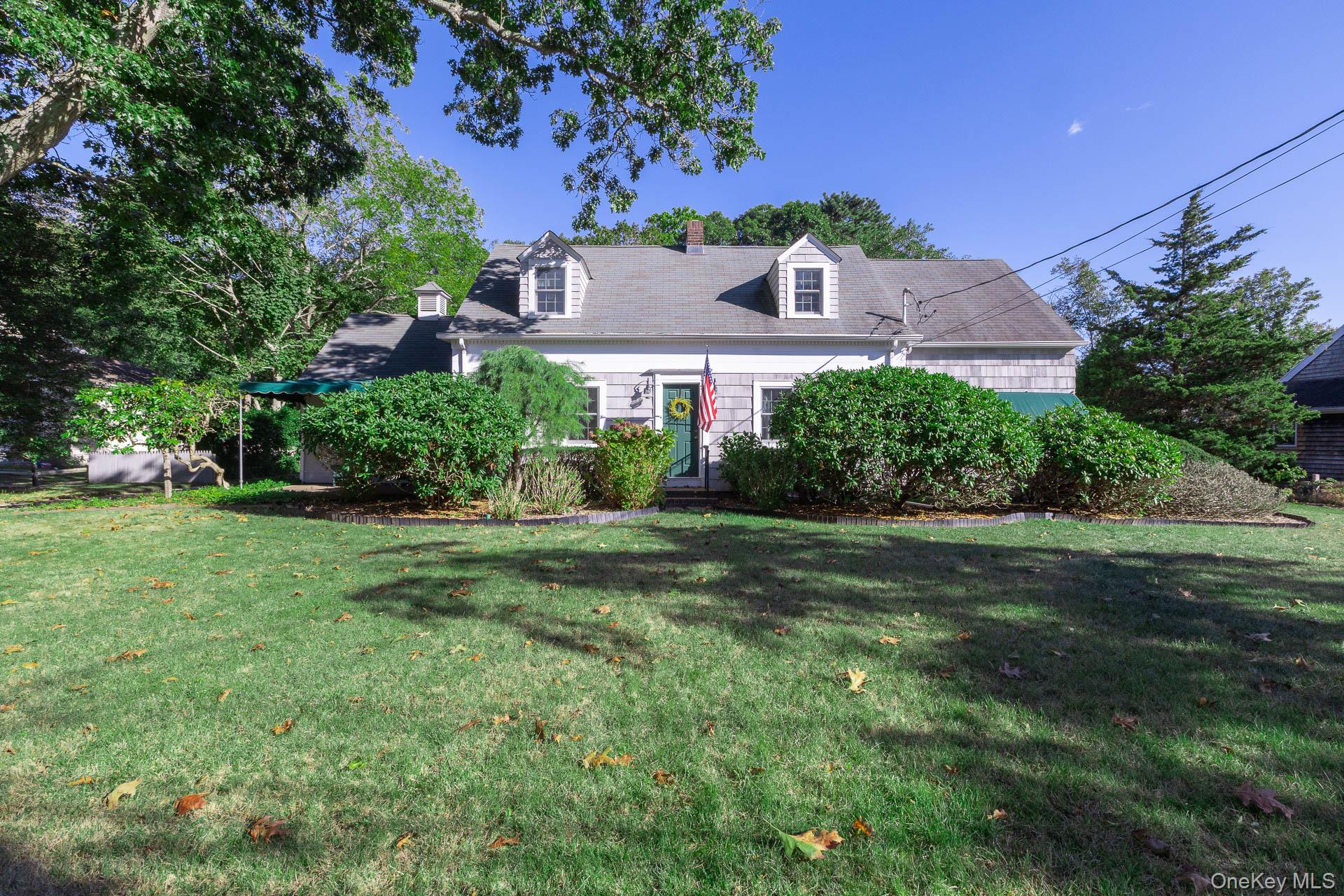 Classically charming single-family residence nestled in the heart of Center Moriches. This 2, 090 sq ft home is situated on an expansive half acre lot. With unique vintage bones, this cape style home features traditional architecture with various modern updates. This 4 bedroom, 2 bathroom meticulously kept home is sure to be scooped up quickly. Some updates include; kitchen with dazzling Silestone counters, contemporary Pella windows, French doors, spacious 1st floor bedroom, front patio with awning, central air conditioning and solar panels. If you are considering this home, you will enjoy a tranquil and private residential setting of small town Long Island.