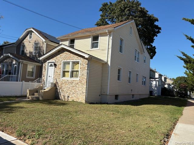 Remodeled, Legal two family house, Detached,  3 bedroom 1 bath apartment over 3 bedroom 1 bath apartment.Finished basement with OSE. New Stainless steel appliances. Detached garage. 32x100 corner lot. Quiet tree lined street near shopping and buses.