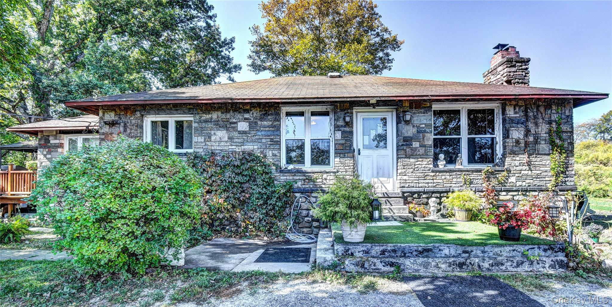 Charming Stone Ranch in a Prime Location. Enjoy convenient one-floor living in this well-maintained 2-bedroom, 1-bath ranch-style home featuring a beautiful full stone exterior. Set back on a .34-acre lot, the property offers privacy and a peaceful setting that feels like your own personal retreat. Inside, youâ€™ll find new flooring throughout, a cozy fireplace, and charming built-in features that add character and functionality. The home also offers plenty of outdoor storage with multiple sheds and a detached garage, ideal for vehicles, tools, or hobbies. Centrally located on Route 17K, directly across from Stewart Airport, this property provides easy access to shopping, dining, and major highwaysâ€”perfect for commuters or anyone seeking both comfort and convenience. A solid and inviting home with great potential and timeless appeal.