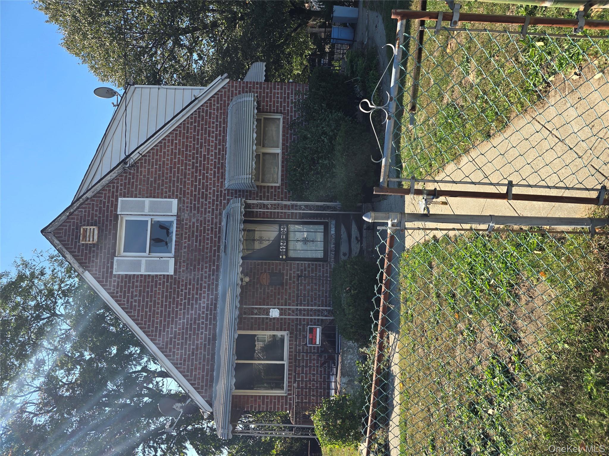 Welcome to 13404 Farmers Blvd. 2 Family Home... 1 bedroom, 1 bathroom, living room and kitchen on 2nd floor. 2-bedroom, 1 bathroom, living room and eat in kitchen on the 1st floor. NEEDS TLC. INVESTORS DELIGHT.