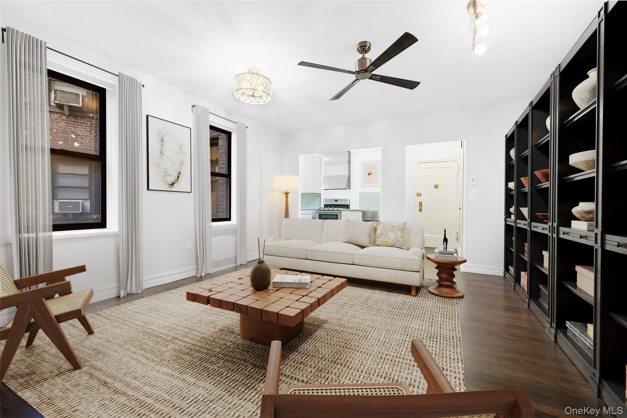 This serene and exceptionally quiet one-bedroom home at 860 Grand Concourse overlooks a tranquil courtyard and combines classic Art Deco design with thoughtful updates for contemporary living. Designed for comfort and style, the residence features a separate entry foyer that opens to a welcoming living room and a windowed eat-in kitchenâ€”an inviting layout ideal for daily living and entertaining.The renovated kitchen offers ample cabinet storage, sleek counters, and full-size appliances, with space to dine by the window. The large bedroom easily accommodates a king-size bed and provides excellent closet space. The original Art Deco bathroom retains its distinctive dusty-rose and deep-red tile palette, complemented by its etched-mirror medicine cabinet and vintage fixtures that reflect the periodâ€™s craftsmanship. With refinished hardwood floors, restored plaster details, and abundant storage throughout, the apartment is in true move-in condition.860 Grand Concourse is a landmarked 1941 Art Deco building celebrated for its architectural integrity and impeccable upkeep. Amenities include a part-time doorman, live-in superintendent, laundry facilities, and pet-friendly policies for owners with dogs under 40 lbs.Located within the Grand Concourse Historic District, the building faces the majestic Bronx County Courthouse and is surrounded by four beautifully landscaped parks offering tracks, dog runs, and open green space. Yankee Stadium, the Bronx Museum of the Arts, and the Bronx Terminal Marketâ€”with Target, BJs, Lidl, Home Depot, and moreâ€”are all close by.Transportation options abound: the D and 4 express trains, B local, and multiple bus lines are nearby, with two Metro-North stations and major highways providing swift access to Midtown Manhattan, less than 20 minutes away. Pied-Ã -terre use and financing up to 85% permitted.Donâ€™t miss this opportunity to own a peaceful, move-in-ready home in one of the Bronxâ€™s most distinguished Art Deco landmarksâ€”schedule your private viewing today.Furnished photographs have been virtually staged.