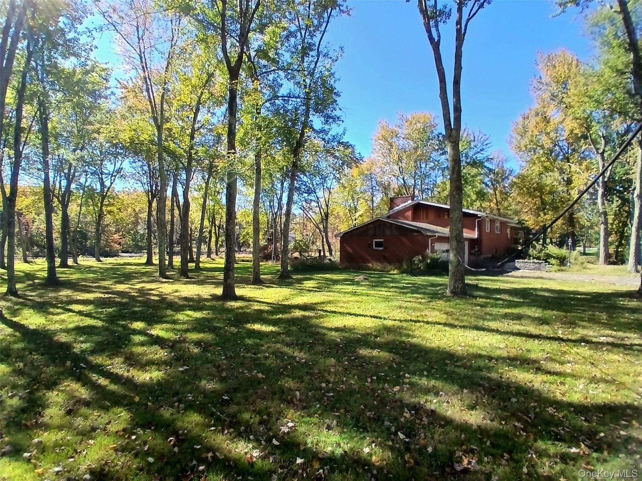 GREAT OPPORTUNITY! First time ever on the market. This is a solidly built mid-century brick house on 5 private scenic acres in the Town of Cornwall, next door to Cornwall Central Highschool. Beautiful 1+ acre private pond, woods, and large front and back yards. Renovating the existing house and grounds would yield an amazing home; alternatively there is potential for building an in-law house with plenty of space, subdividing, or redevelopment with nearly 500-ft of frontage on Route 94. The house needs renovations, but all utilities are fully functioning. Endless possibilities, come see it for yourself! (Showings by appointment only.)