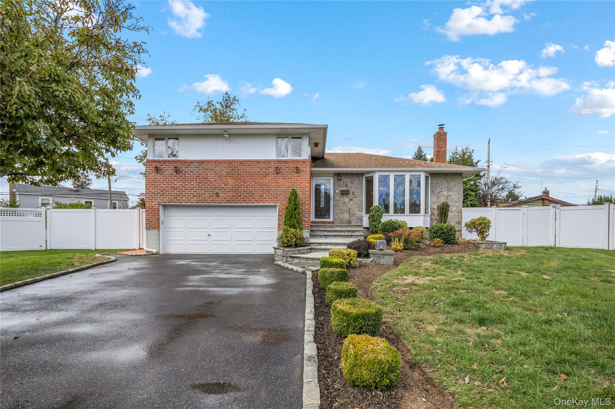 This beautifully renovated split-level home is tucked away on a peaceful cul-de-sac in the sought-after Plainviewâ€“Old Bethpage School District. Step inside and fall in love with the bright, open layout featuring hardwood floors throughout and a fully updated eat-in kitchen with modern cabinetry and direct access to a spacious backyard deck, perfect for relaxing or entertaining.Upstairs youâ€™ll find three comfortable bedrooms and two full baths, including a private primary suite. The lower level offers extra living space ideal for a family room, home office, or play area, along with laundry and plenty of storage. Additional highlights include Anderson windows, updated electric (200 amps), gas heat, central air, and an attached two-car garage with interior access.Located just minutes from parks, schools, shopping, and major roadways, this home combines suburban tranquility with everyday convenience. Move-in ready and freshly updated. Your new Plainview home awaits!