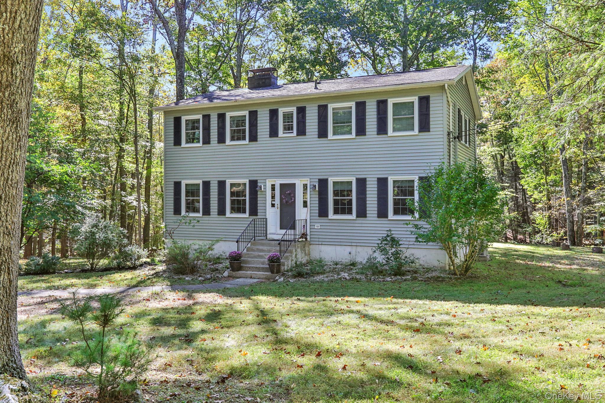 Charming Colonial on just over 6 Acres with serene forest views in desirable New Paltz, NY location. This beautifully maintained four-bedroom, 2.5-bath colonial surrounded by nature offers a perfect balance of comfort, modern updates, and peaceful living. Step inside to find gleaming hardwood floors, an updated kitchen with manufactured stone countertops, custom crafted cabinetry, and a bright, open layout ideal for entertaining. Enjoy multiple living spaces, including a formal living room with fireplace and a cozy den that opens to an enclosed back porch overlooking the natural landscape with serene forest views. A wonderful spot to enjoy morning coffee or unwind at sunset. The property&rsquo;s expansive acreage provides privacy and opportunities to explore the outdoors right from your backyard. The upstairs main bedroom suite has a full private bath along with a statement piece wood burning fireplace. Additional highlights include energy-efficient mini splits for cooling and supplemental heat, a two-car garage, a whole house generator with automatic switching, updated water heater, ample storage, and much more. 15 minutes to down town New Paltz, and to Kingston, close proximity to local farmers markets, hiking trails, wineries, breweries, Less than 2 hours to NYC. This home is the perfect blend of country charm and modern convenience. A true Hudson Valley retreat.