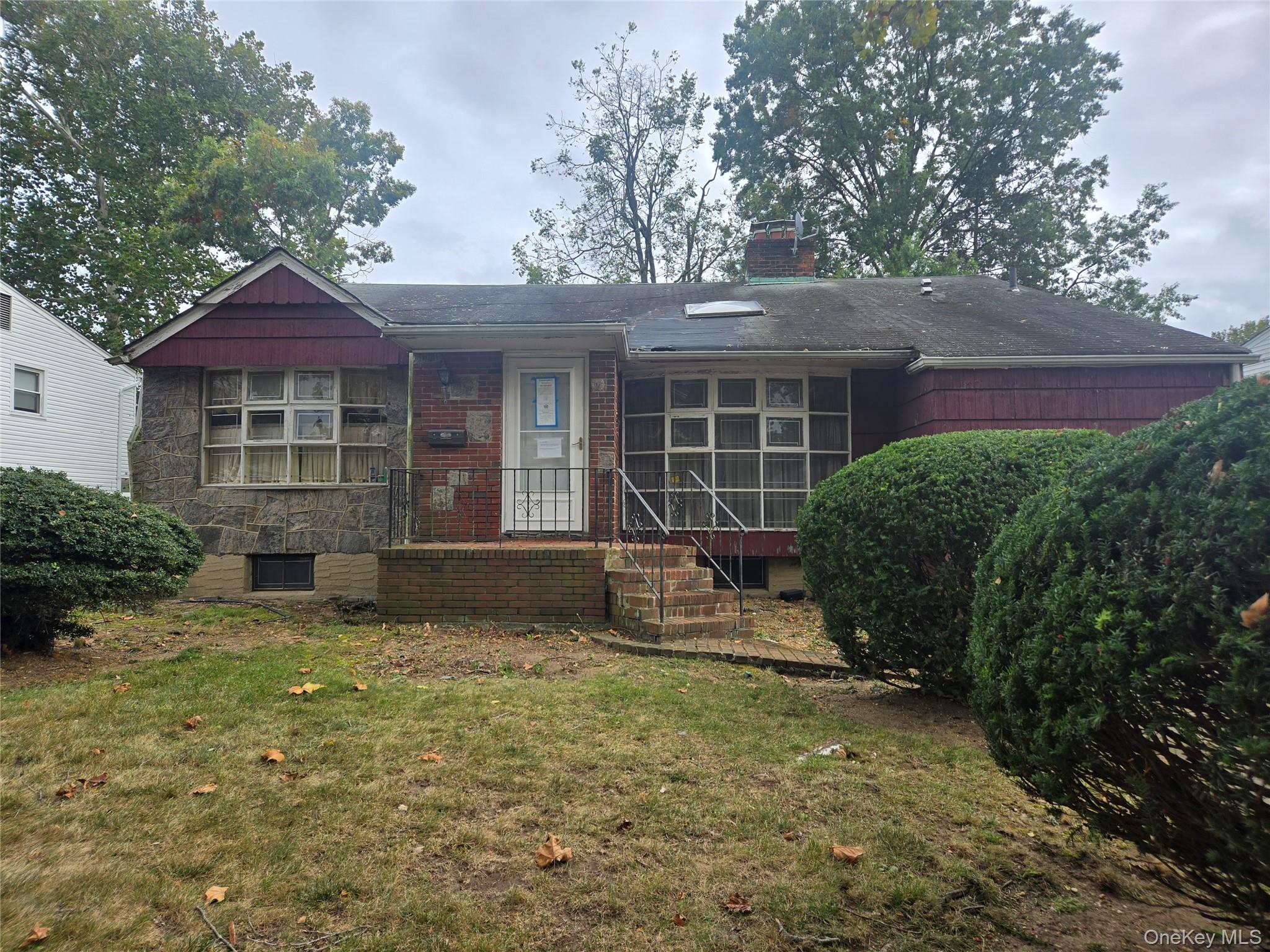 This spacious Split-Level home offers endless potential with 4 bedrooms, 2.5 bathrooms, a welcoming living room with fireplace, and a cozy den featuring a second fireplace. The home also includes a full basement and a 1-car garage. Situated in a desirable East Meadow neighborhood, this property is perfect for end users with vision or investors seeking a full renovation project. With solid bones and a fantastic layout, this home provides the opportunity to create your dream residence in a prime location close to shopping, schools, and transportation.