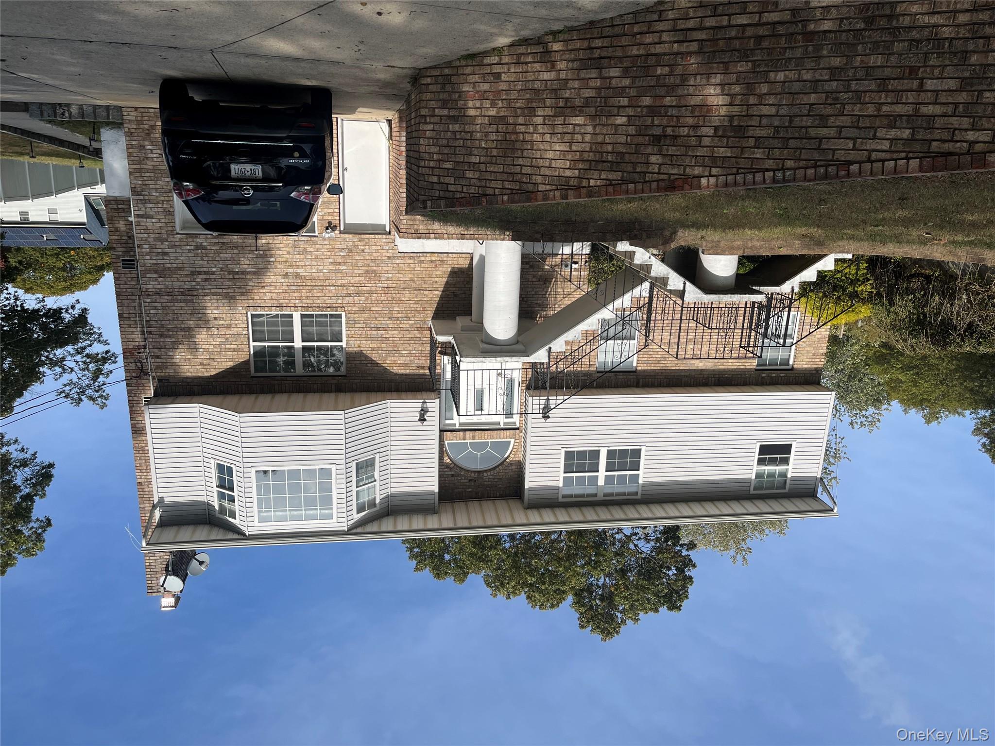 beautiful 3 bedroom, 1 1/2 bath, hardwood flooring, living room with fireplace, dining room with deck, new kitchen with stainless steel appliances, master bedroom with 1/2 bath, driveway parking. Utilities are included except cable.