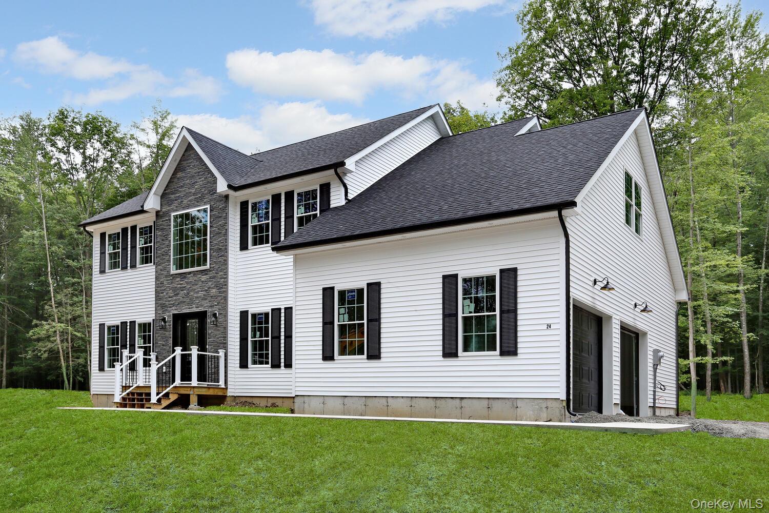 MOVE IN JUST IN TIME FOR THE HOLIDAYS â€” WHERE STYLE, SPACE & COMFORT COME TOGETHER!This stunning new construction, built with heart and design in mind, sits proudly on one of the last premium lots in an exclusive 9-lot subdivision â€” a serene cul-de-sac setting on a sprawling, flat 3-acre parcel. Offering over 3, 000 sq. ft. of beautifully finished living space, plus a 1, 250+ sq. ft. walkout-ready basement and an oversized 635+ sq. ft. two-car garage, this home provides nearly 5, 000 sq. ft. in total for you to enjoy, entertain, and grow.Step onto the welcoming Trex front porch, gracefully covered by a freestanding roof with soffit-mounted recessed lighting and accented by a charming railing, the perfect spot to sip cocoa and watch the seasons change. The front elevation showcases Tendo cultured stone veneer and classic window shutters, creating undeniable curb appeal that blends craftsmanship with character.Inside, an impressive two-story foyer sets the tone, opening to a bright, airy main level designed for todayâ€™s lifestyle. The gourmet walk-through kitchen features Quartz countertops, stainless steel appliances, a designer farmhouse apron-front sink, a vented range hood, center island, chic tile backsplash, and ambient lighting, all connecting seamlessly to the cozy dinette and spacious family room with a custom-built dramatic gas fireplace. Entertain in style in the formal dining room, or retreat to the inviting living room and versatile office/den. A stylish powder room adds convenience to the main level.Step outside to the 14â€™ &#215; 10â€™ deck, perfect for alfresco dining or quiet evenings surrounded by nature. Upstairs, the primary suite impresses with a cathedral ceiling, large walk-in closet, and a luxurious ensuite bath featuring dual vanities, a soaking tub, and a fully tiled shower. Three additional spacious bedrooms, a full bath with dual vanities, a convenient laundry room, and a flexible finished bonus room over the garage provide room for everyoneâ€™s needs.Additional highlights include hardwood flooring throughout, a walkout basement with egress windows and rough plumbing for a future bath, a mudroom for daily convenience, extra garage storage, an underground propane tank for clean energy, and a Lincoln Park door offering a sleek, modern Craftsman look with lasting durability.Celebrate the holidays and every season ahead in this extraordinary new home that blends quality, beauty, and comfort in every detail. Schedule your private tour today and make this your forever home!